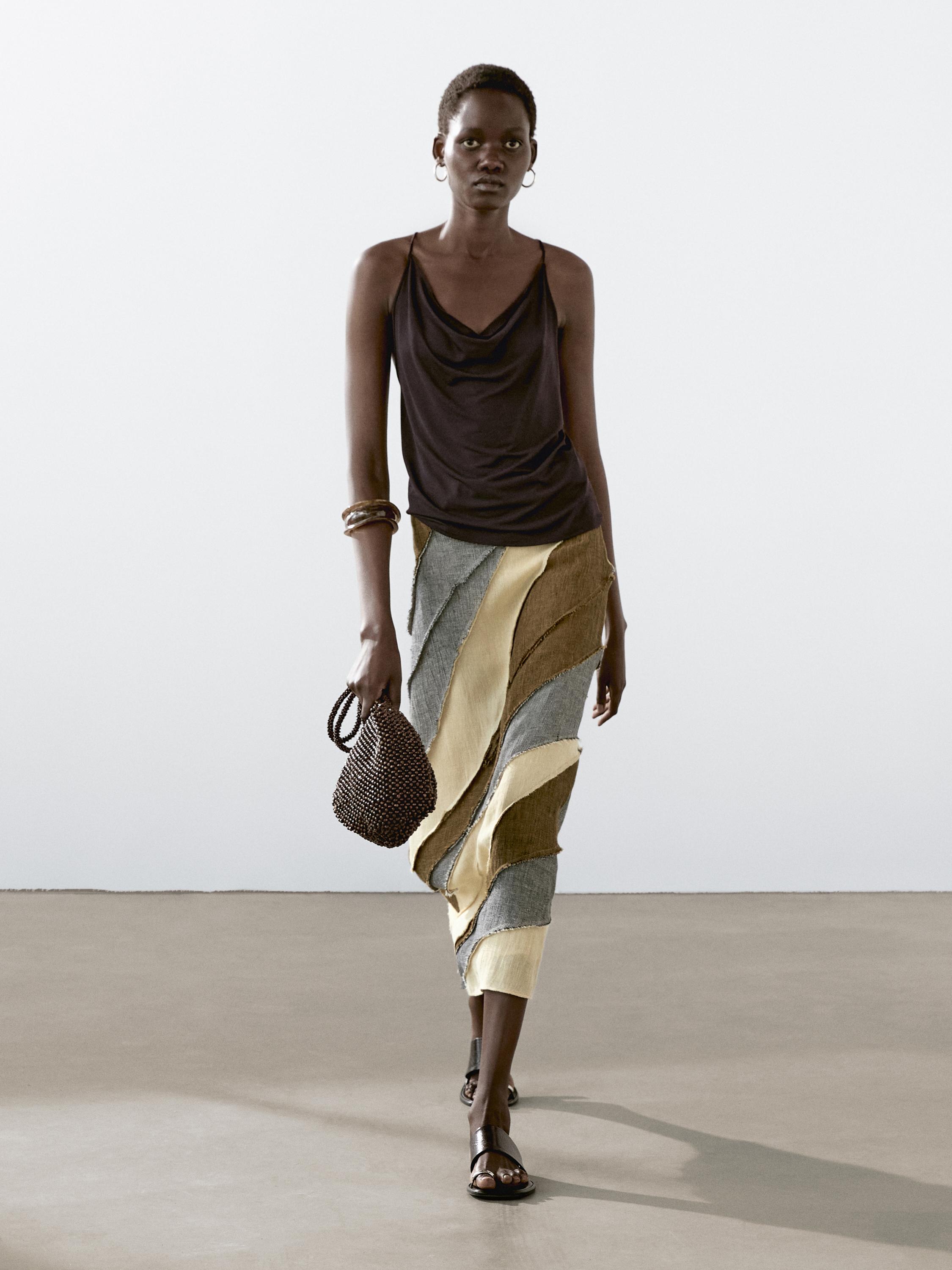 Flowing strappy top with crossover back