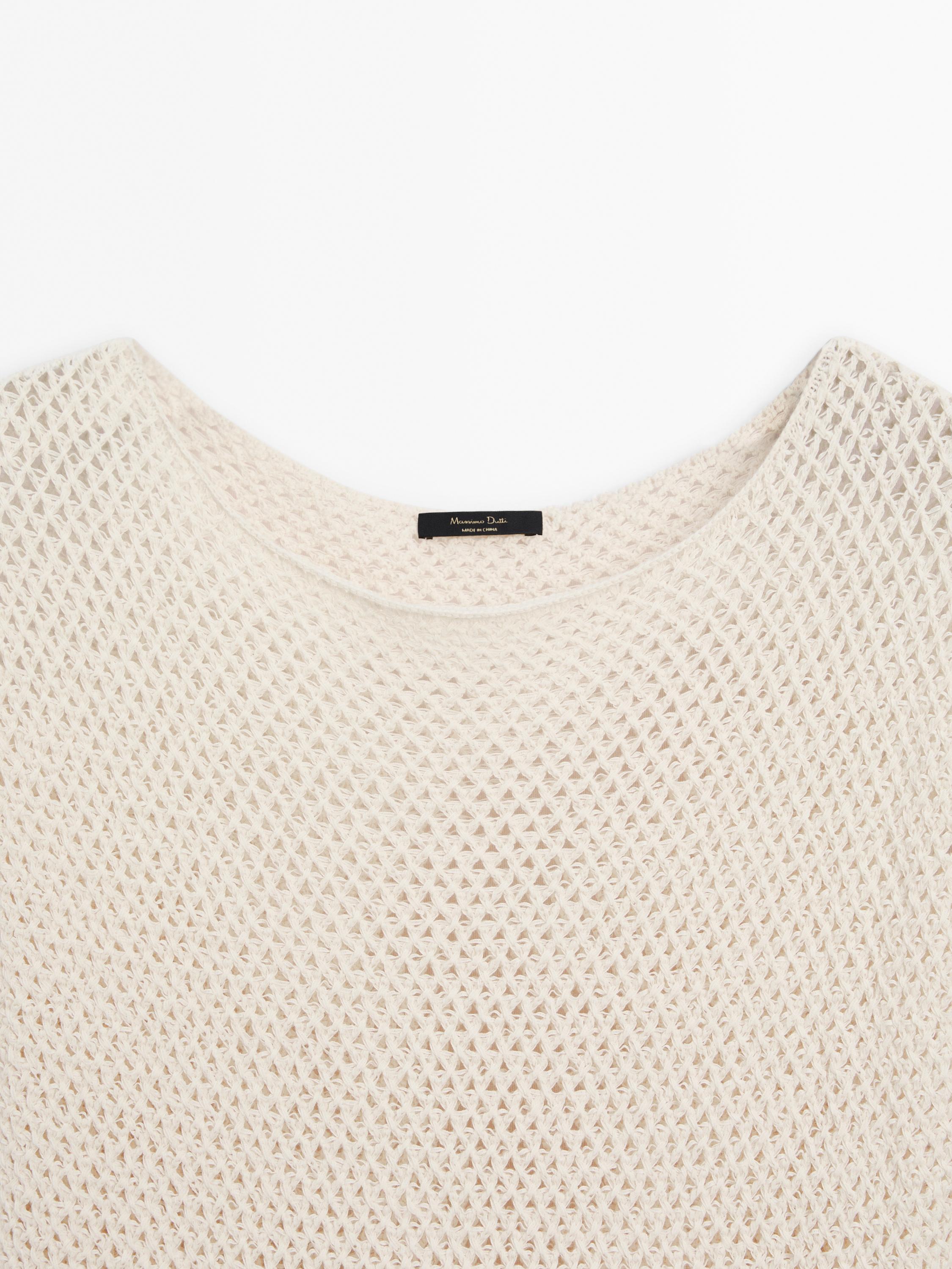 Knit vest with vent details
