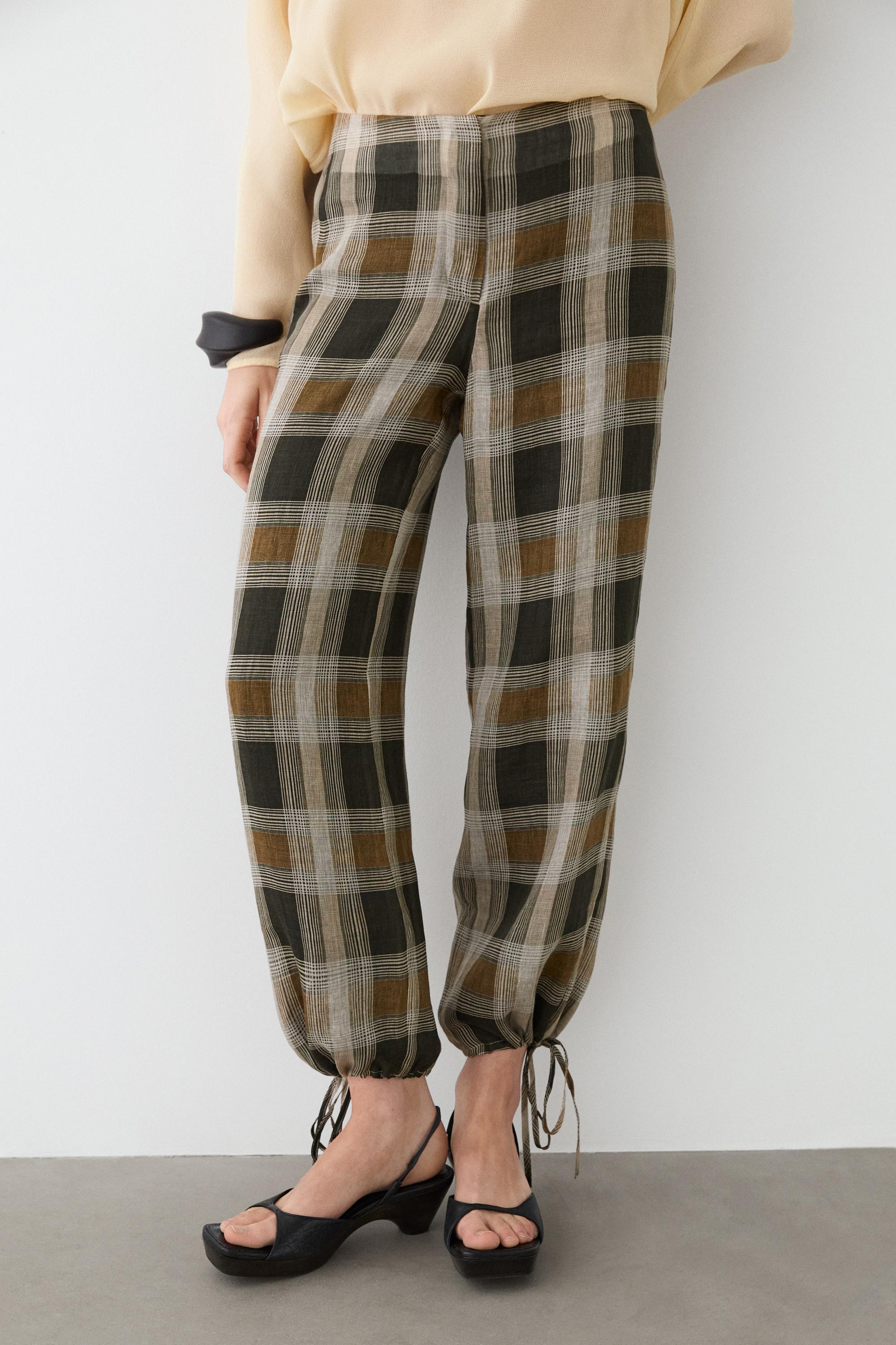 Check print sarouel trousers — BLACK