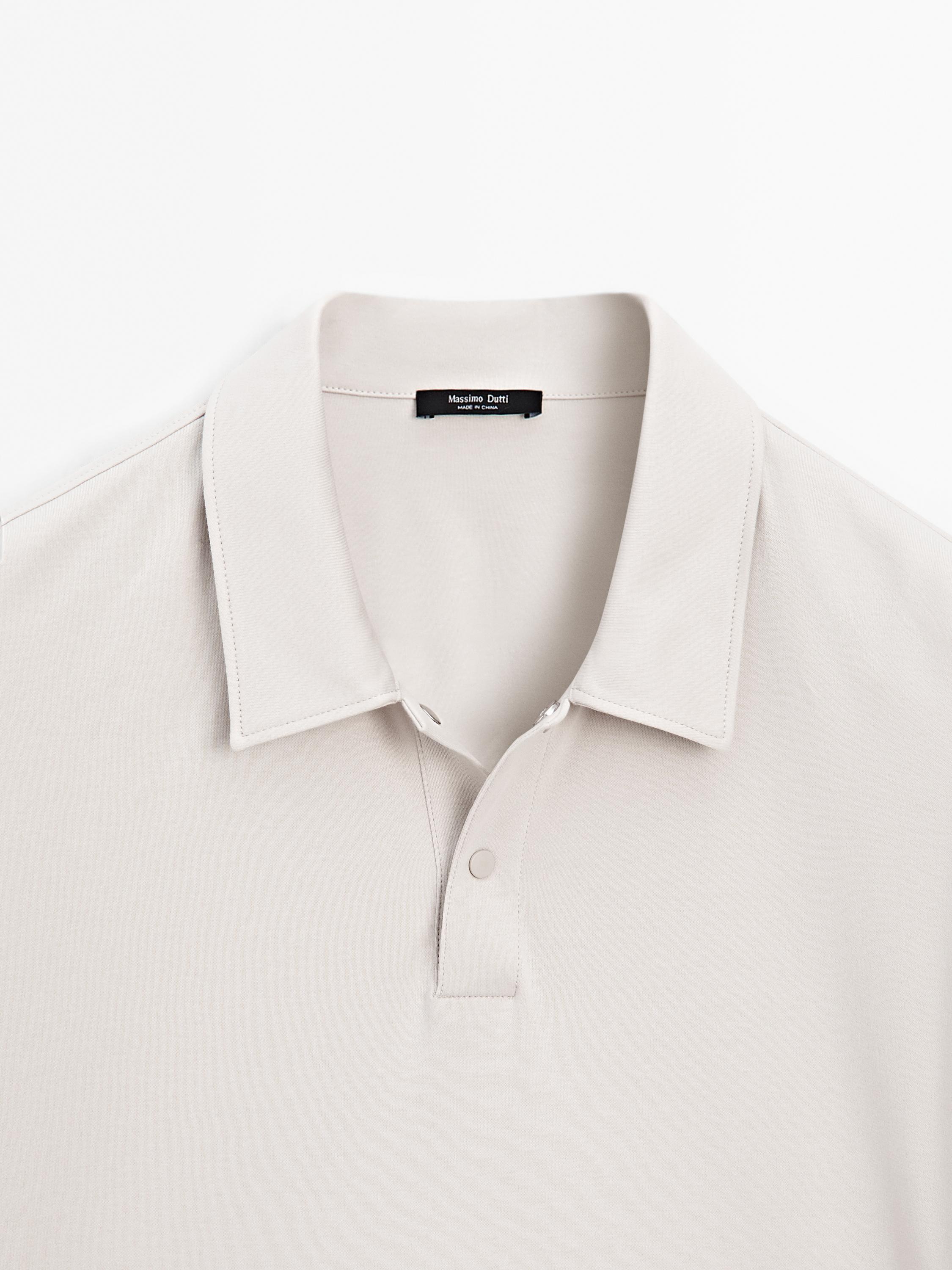 Short sleeve polo shirt with snap-button placket