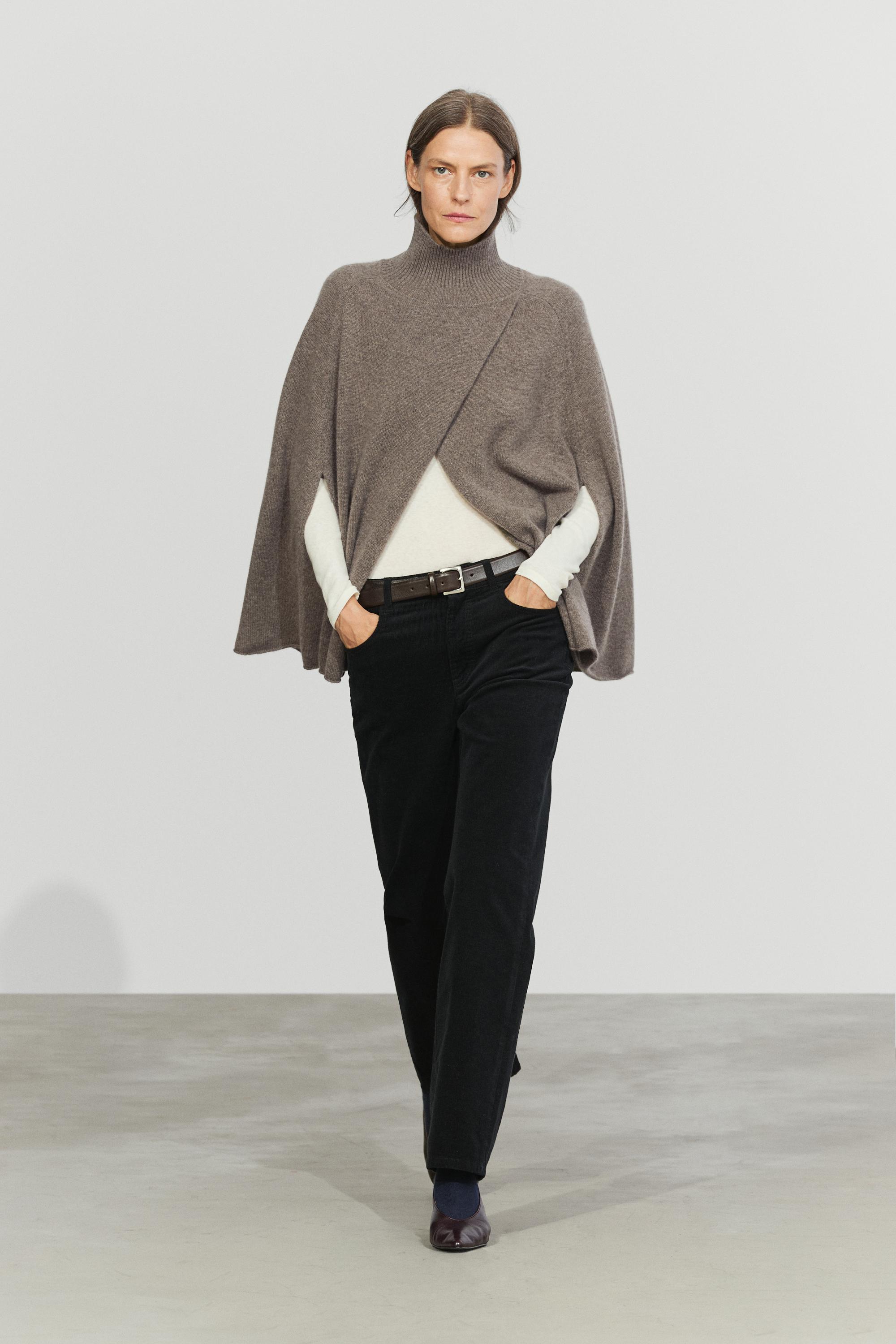 100% cashmere knit cape with crossover detail