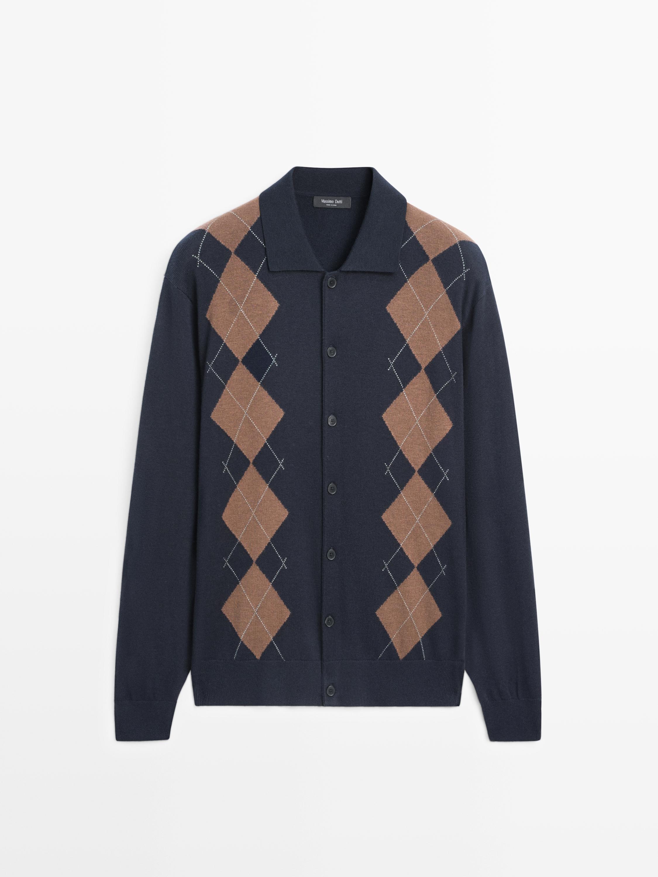 Front view of a navy blue cardigan with brown and black argyle, central button placket, and classic collar.