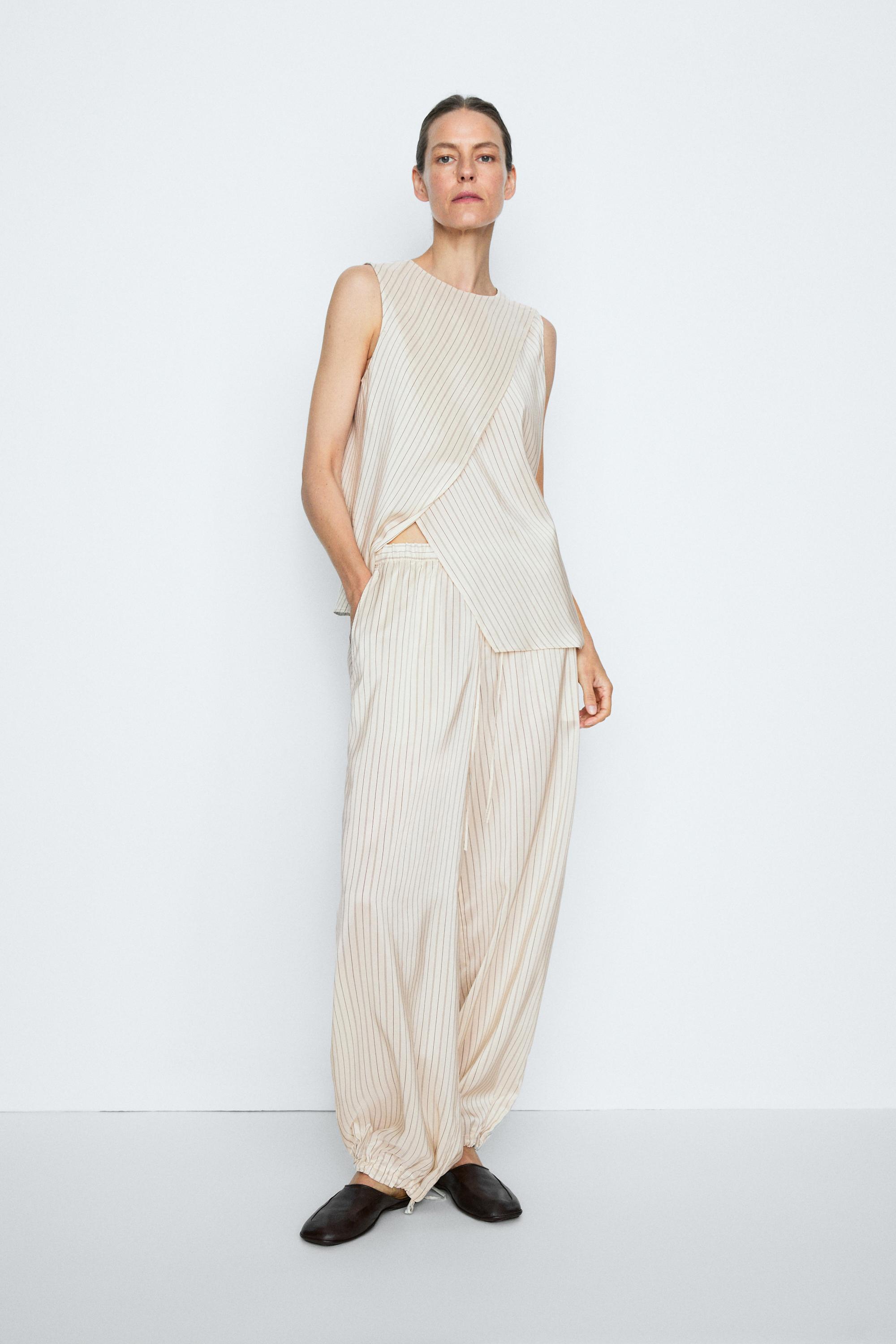 Striped flowing drop crotch pants - STUDIO — CREAM
