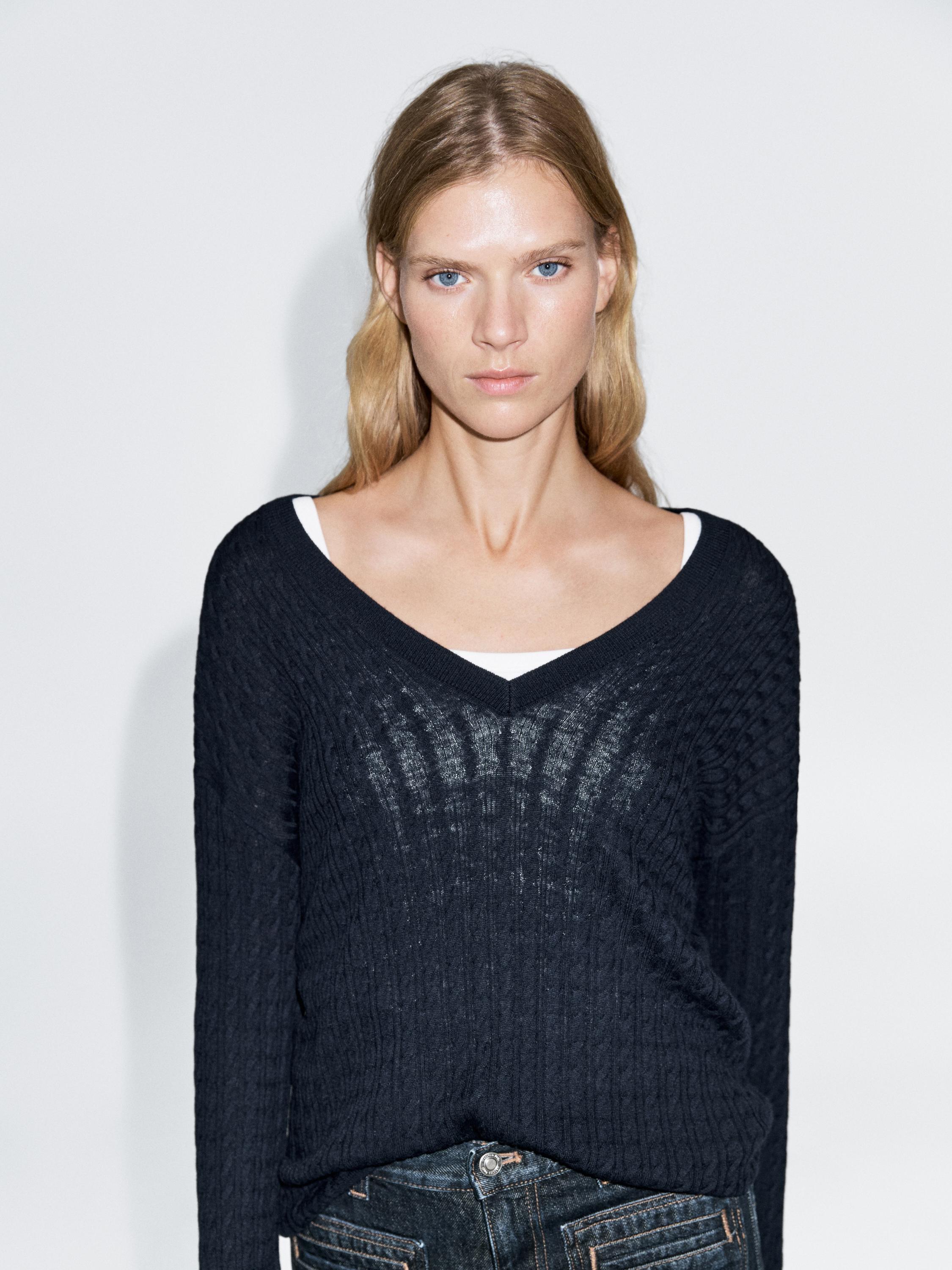 V-neck cable-knit sweater