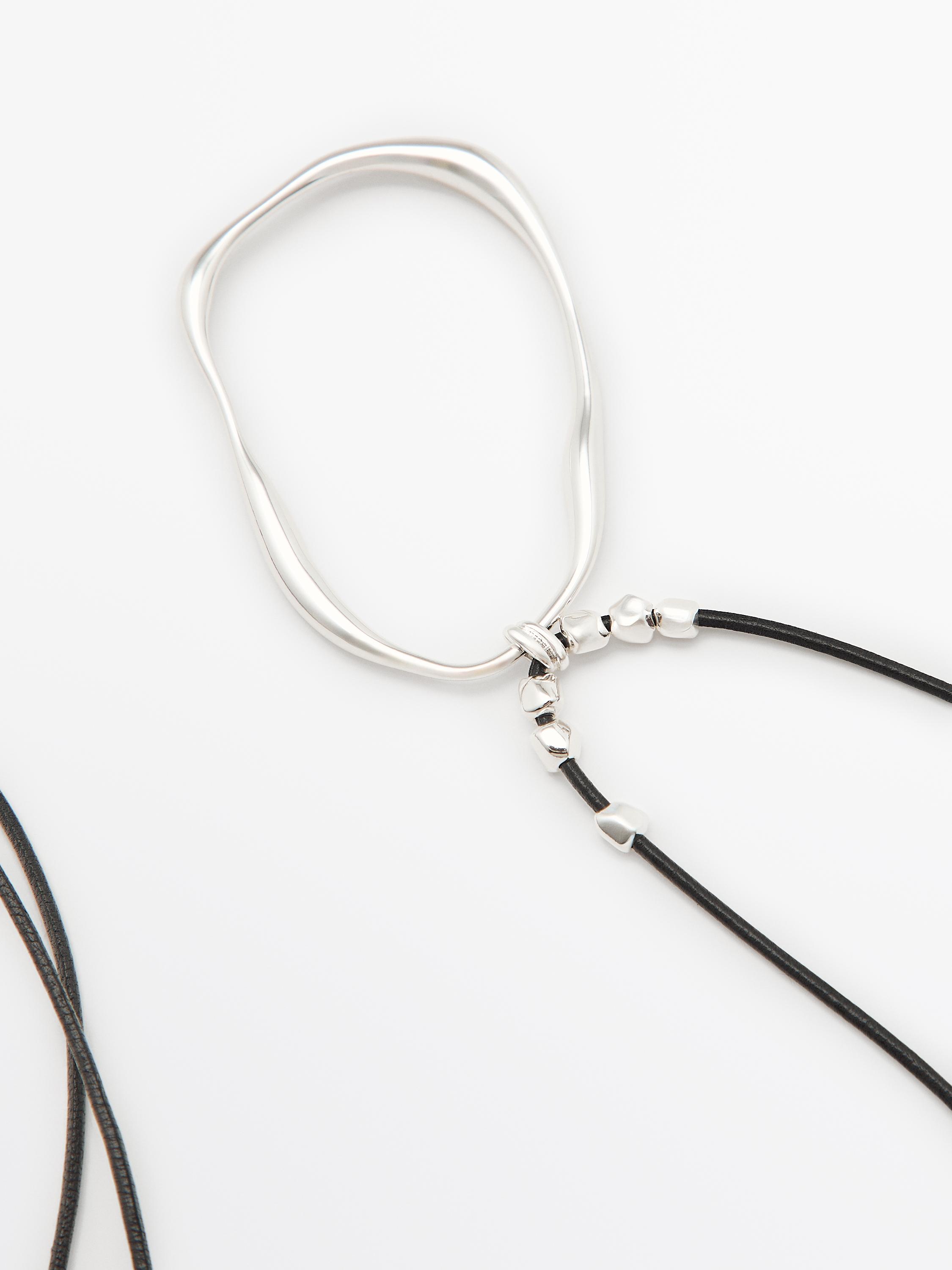 Leather cord necklace with asymmetric piece
