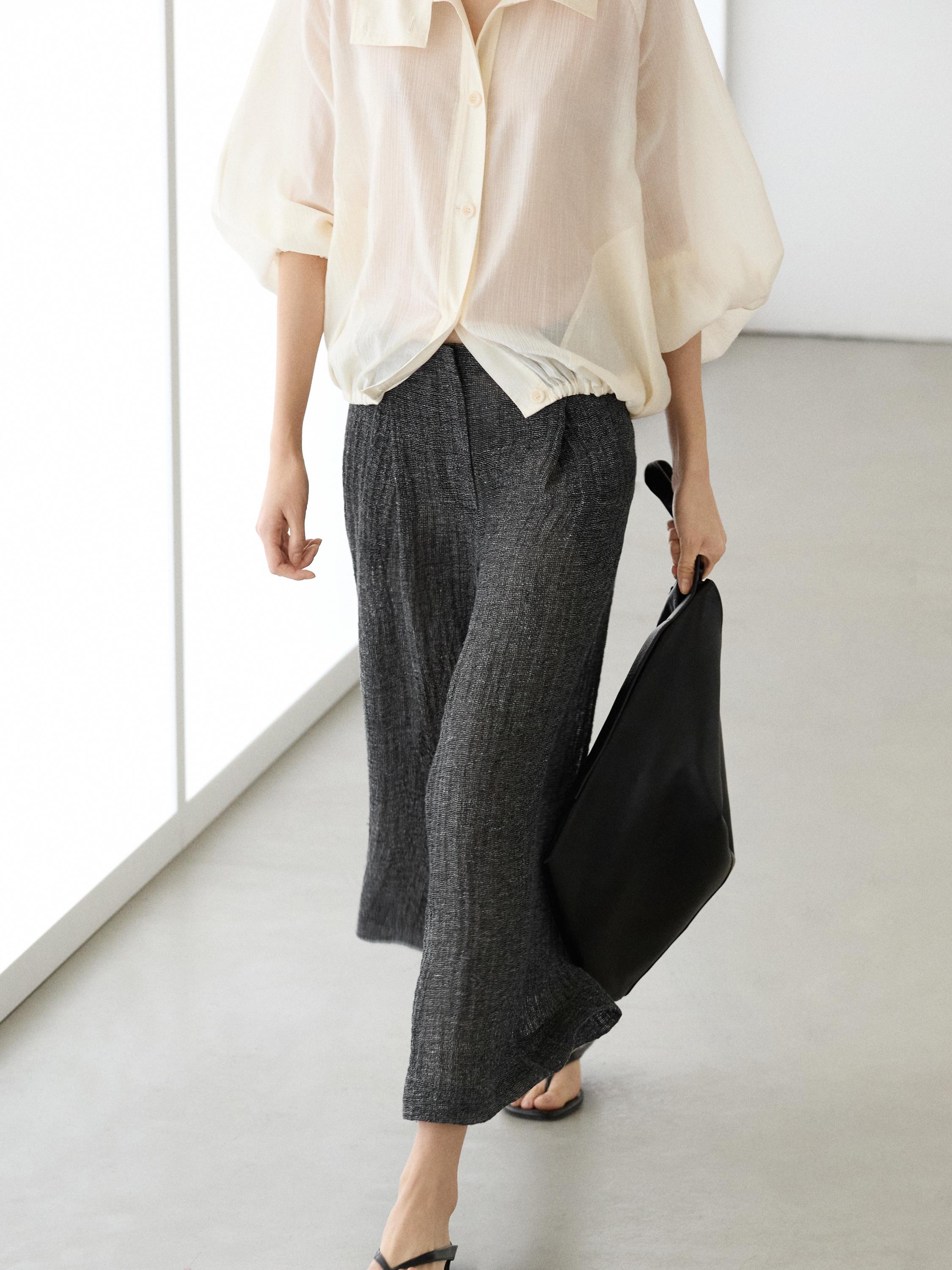 Pantalón pinzas total look melange lino