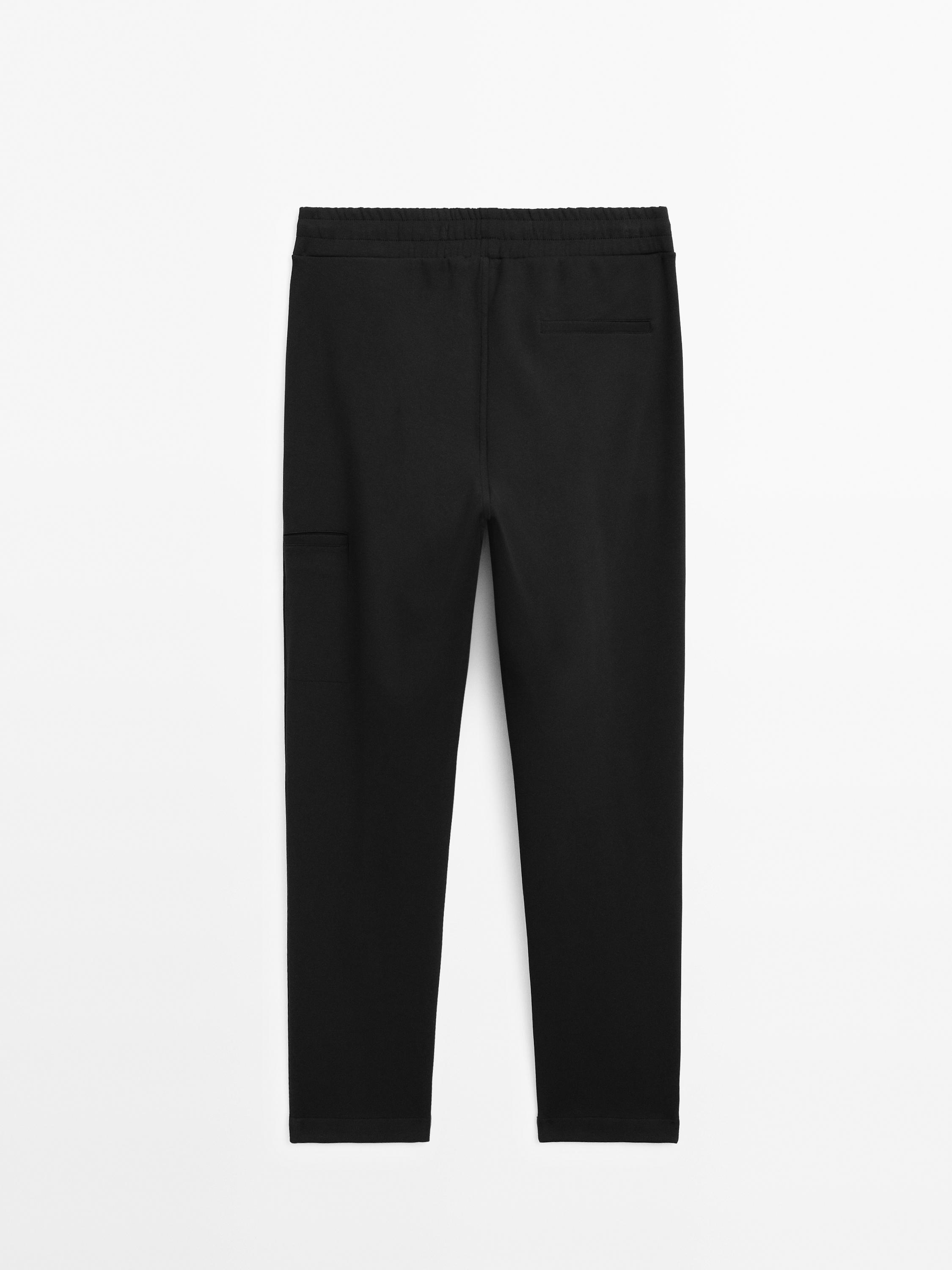 Trousers with side pocket detail