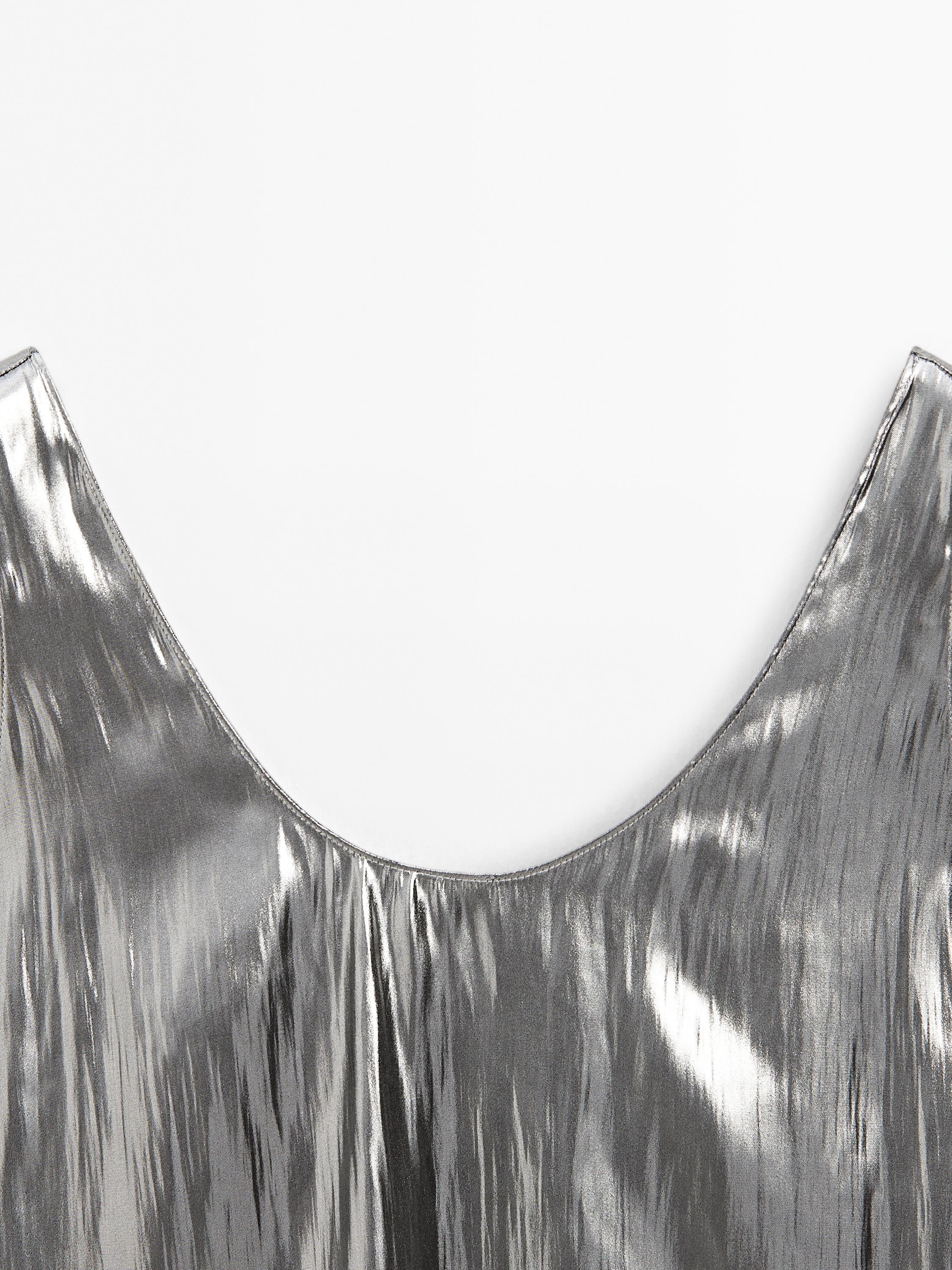 Flowing metallic strappy top