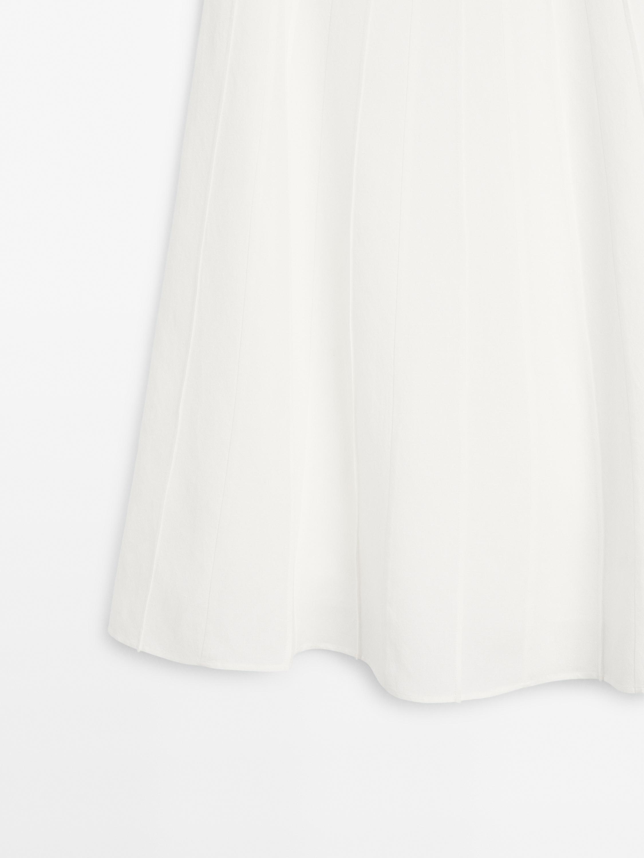 Flared midi skirt with seam details