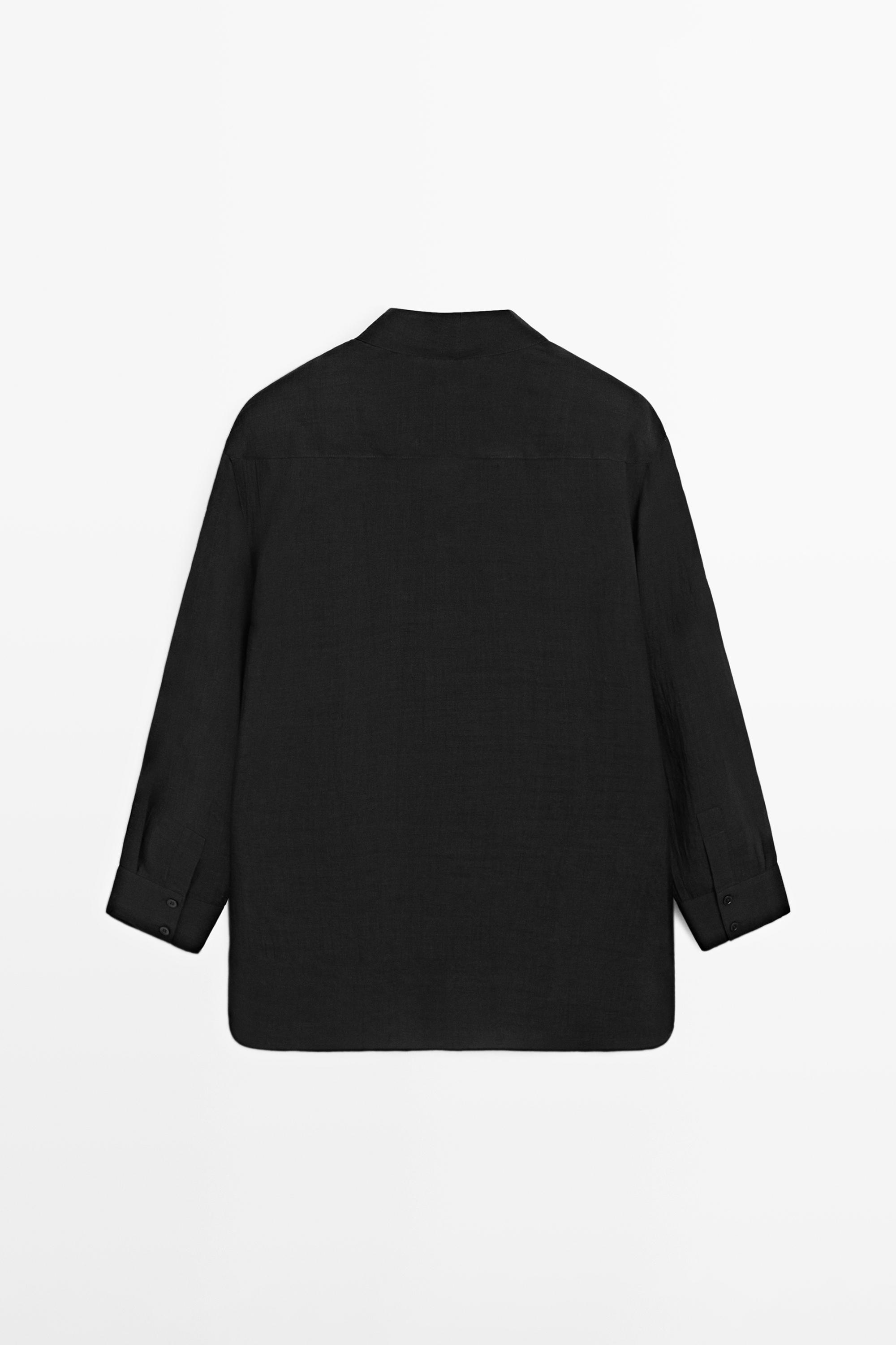 Flowing semi-sheer shirt with chest detail — BLACK