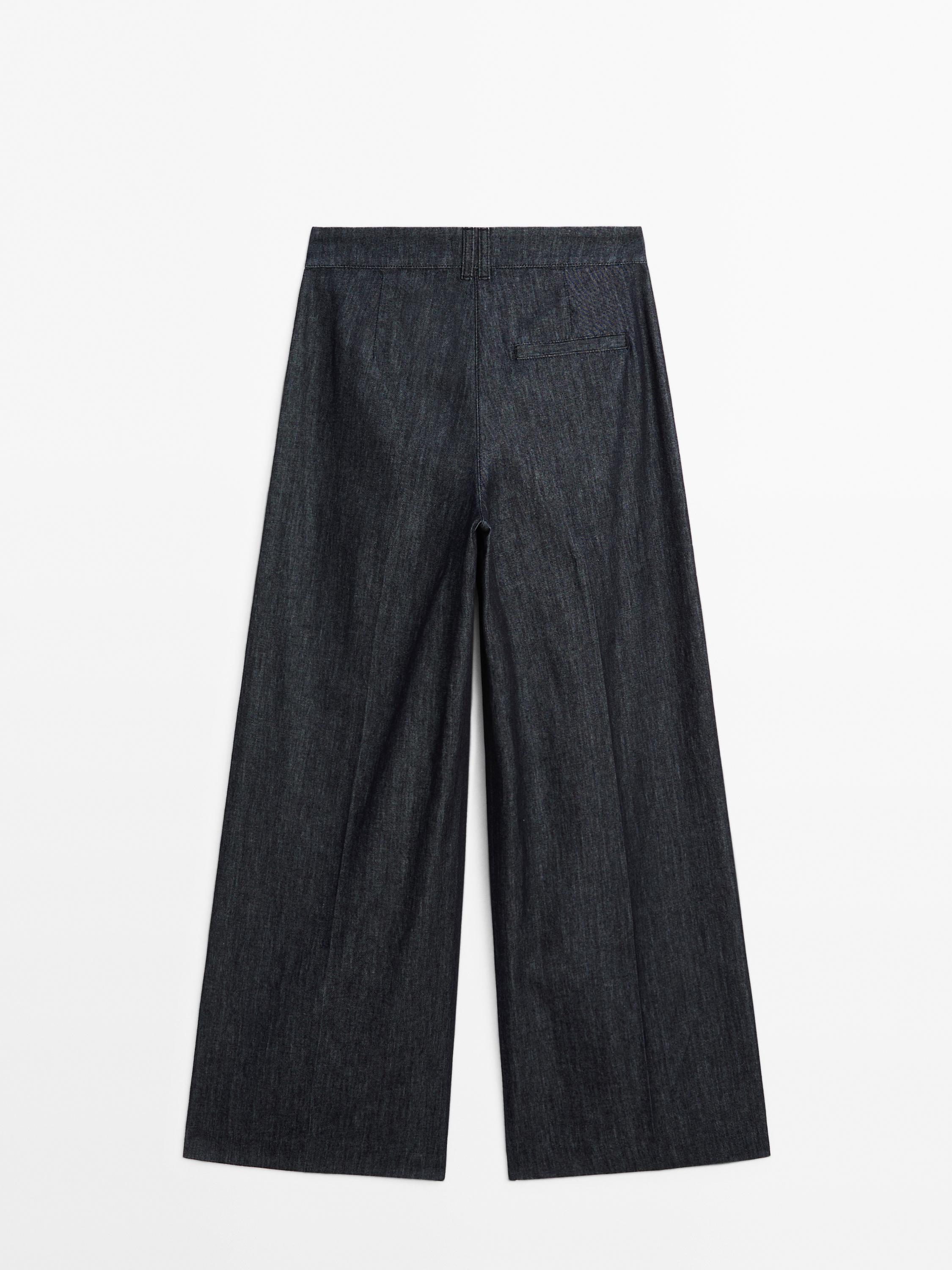 Lekkie jeansy z szerokimi nogawkami i wysokim stanem