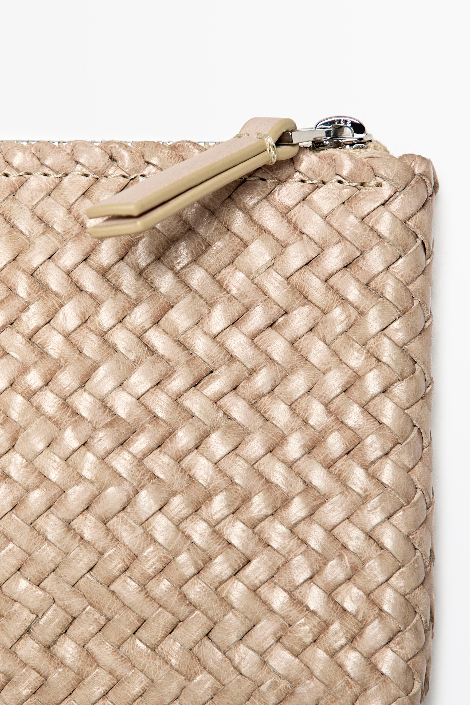 Braided nappa leather pouch bag — CREAM
