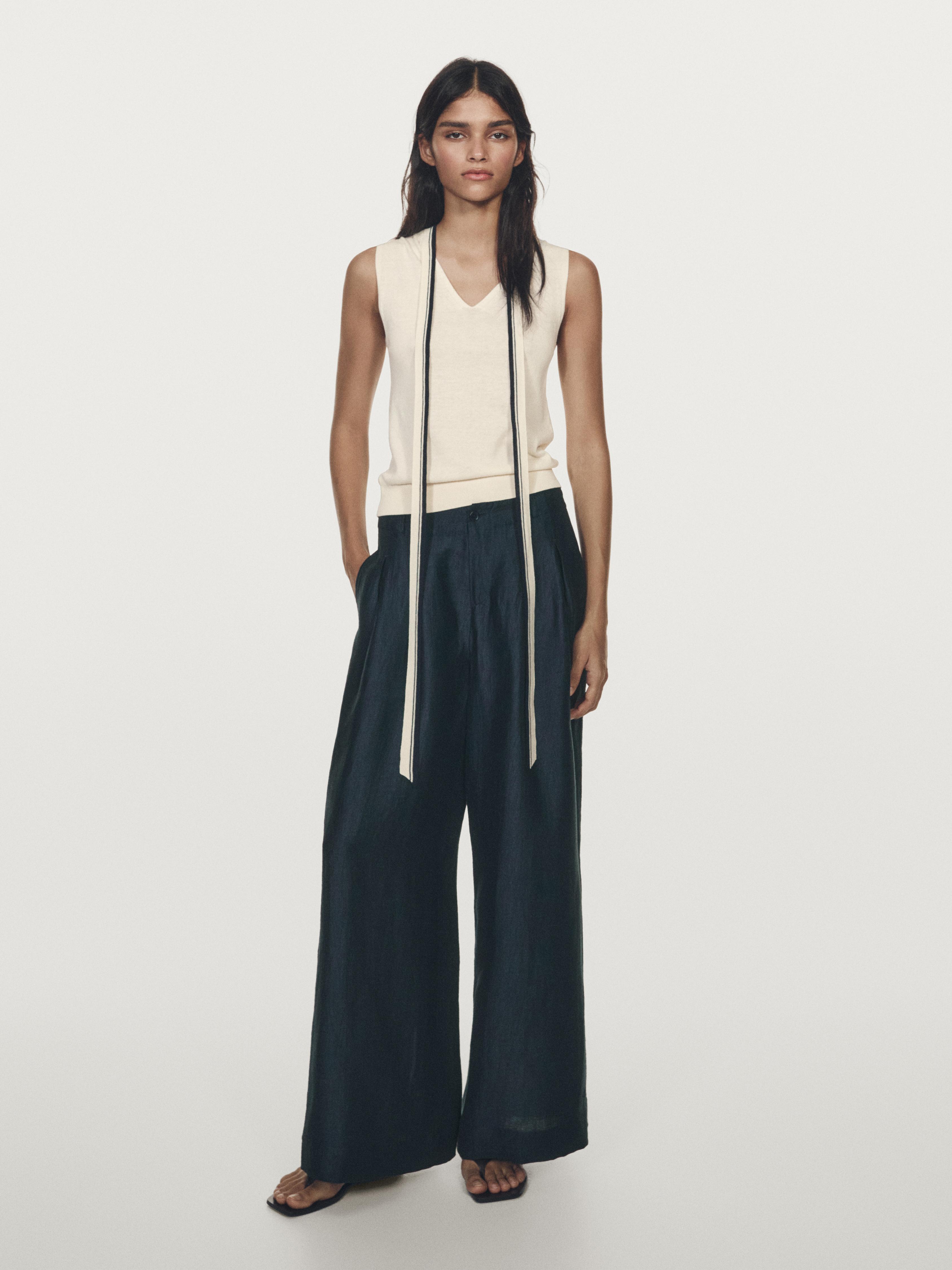 Knit vest with tie detail