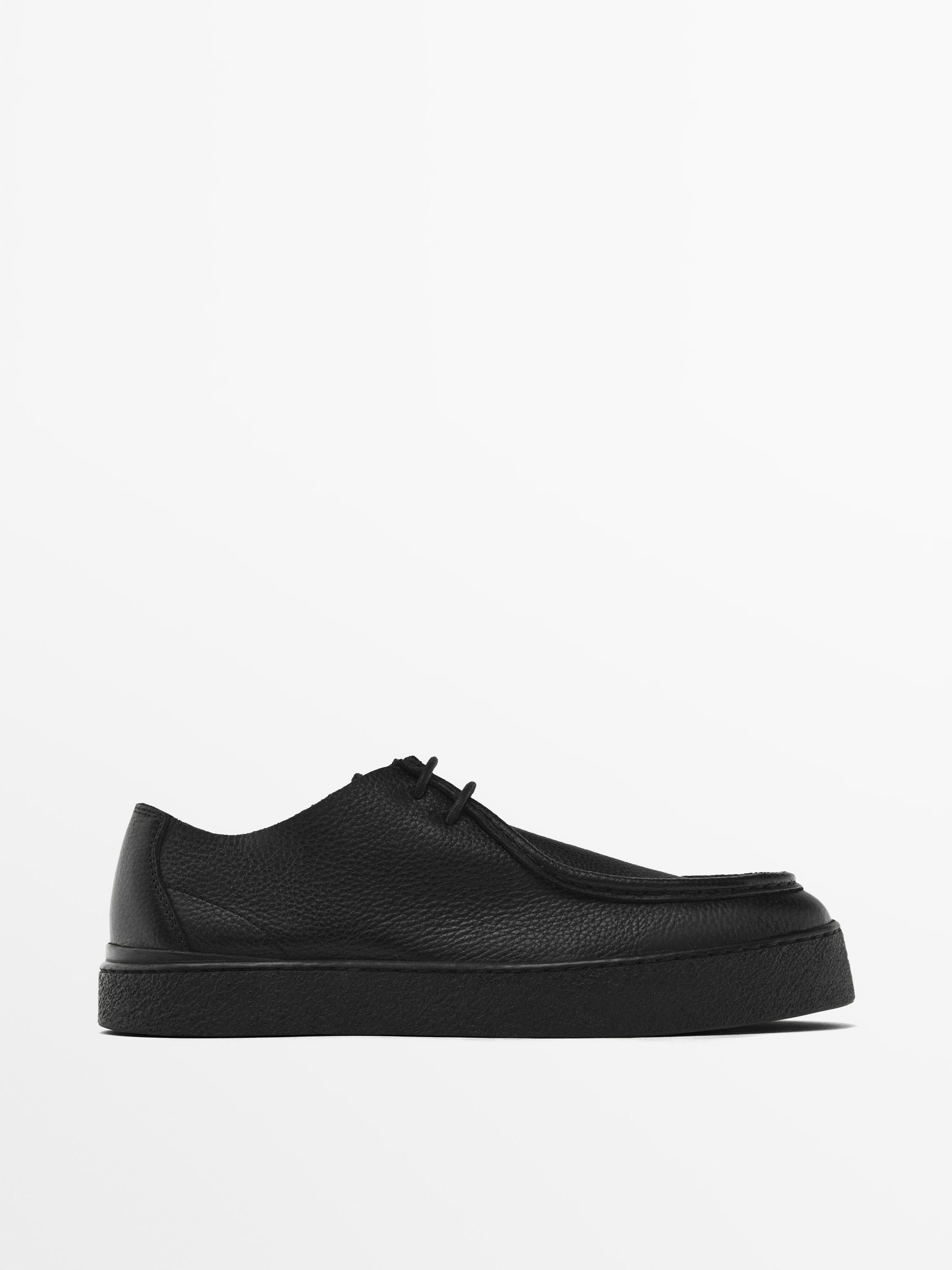 Chaussures noires en cuir souple