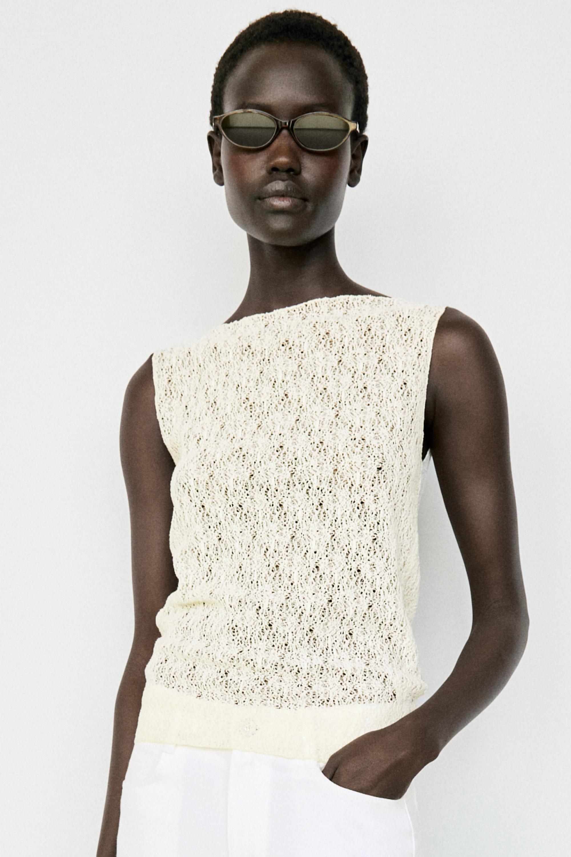 Sleeveless open-knit top — CREAM