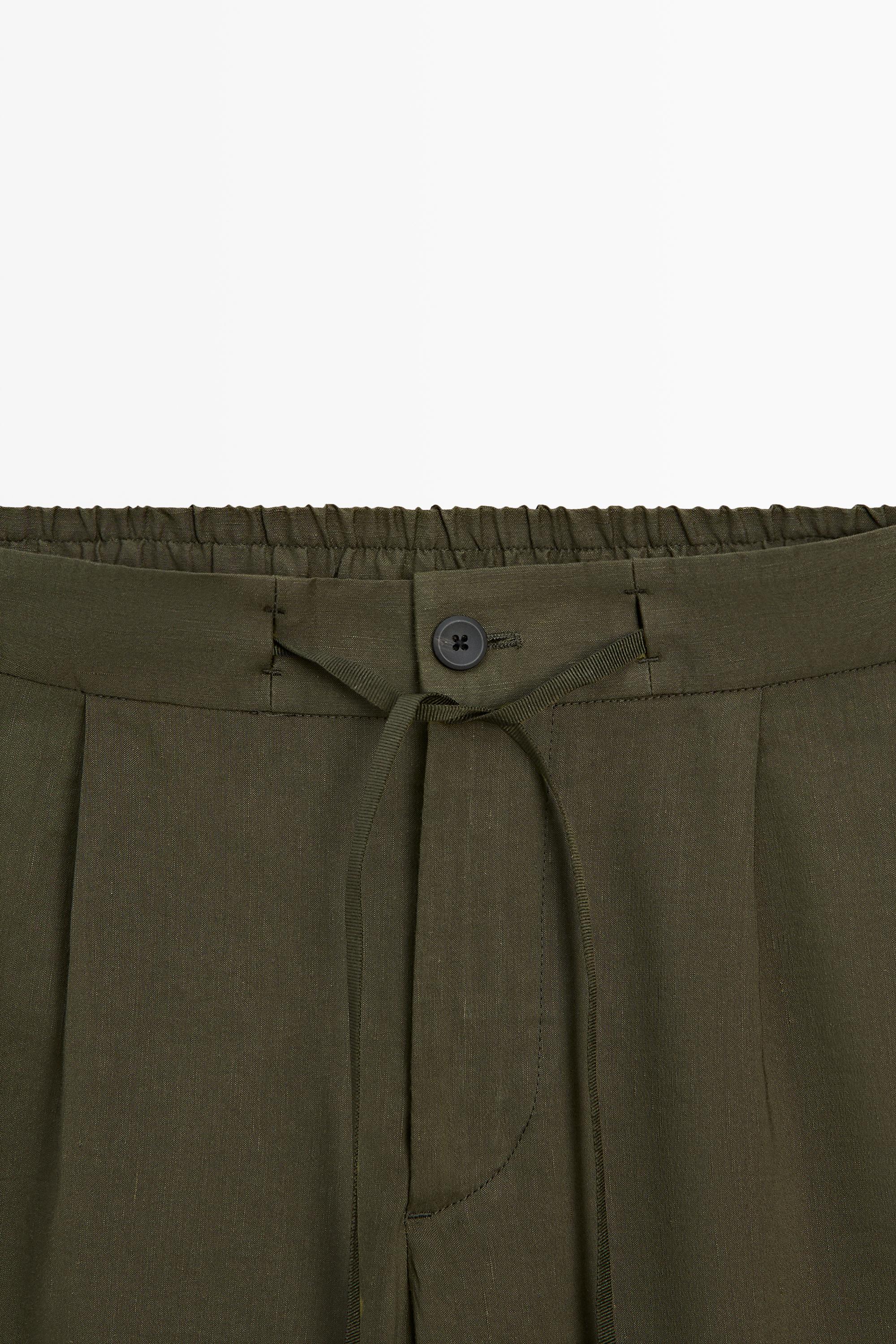 Total look darted jogger fit trousers — GREEN