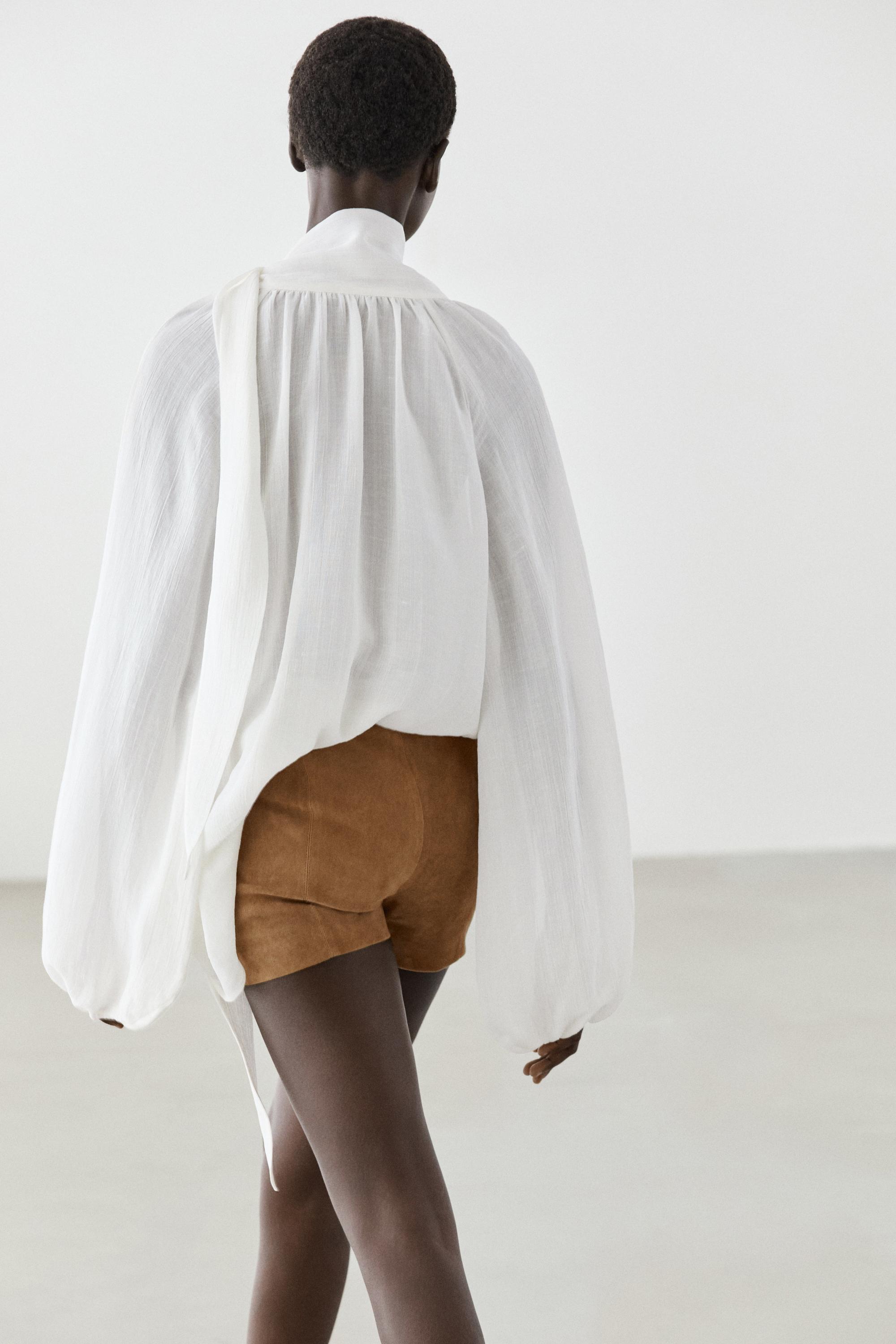 Suede leather shorts with seam details — CAMEL