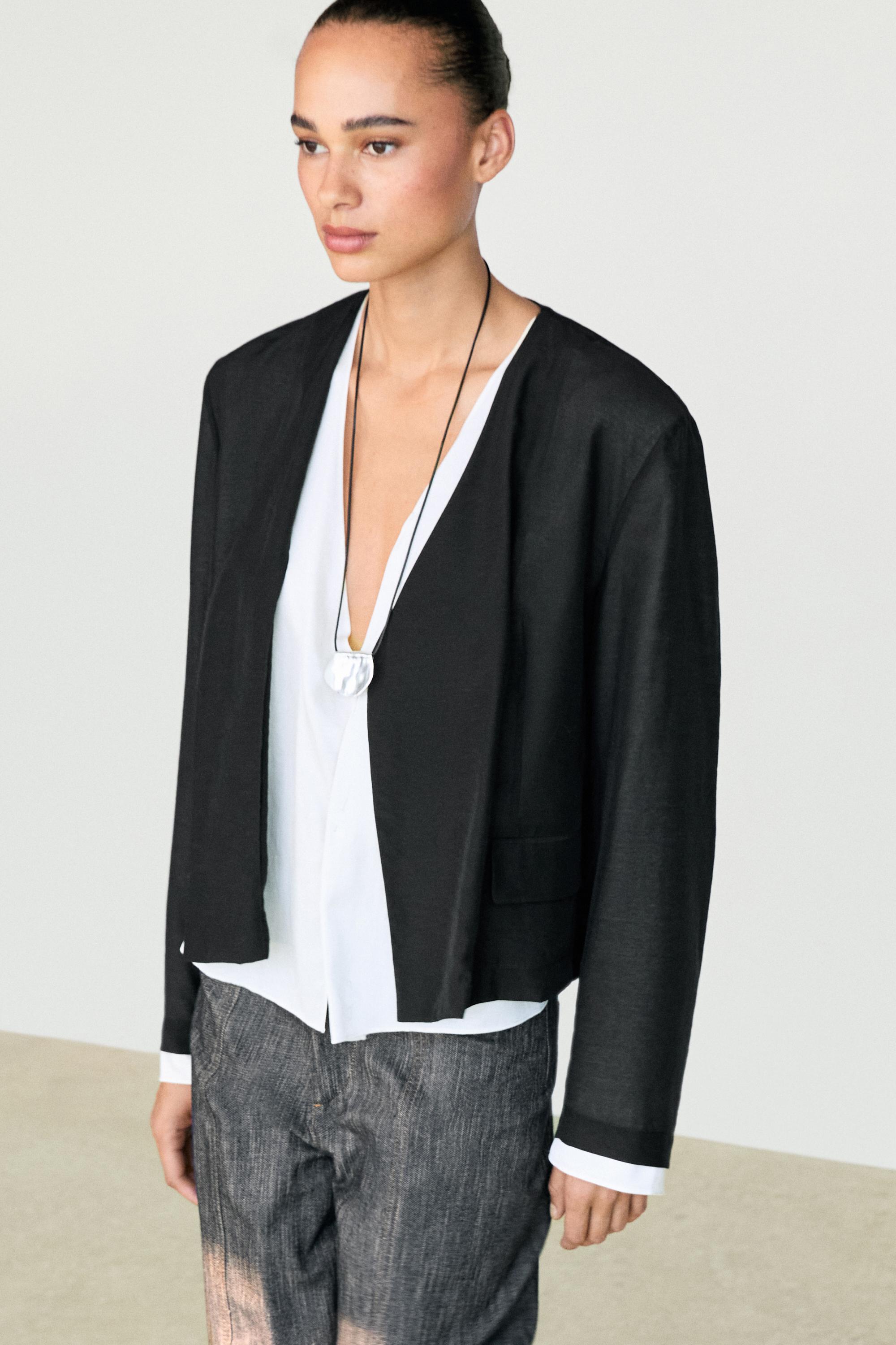 Contrast double jacket for a complete look — BLACK
