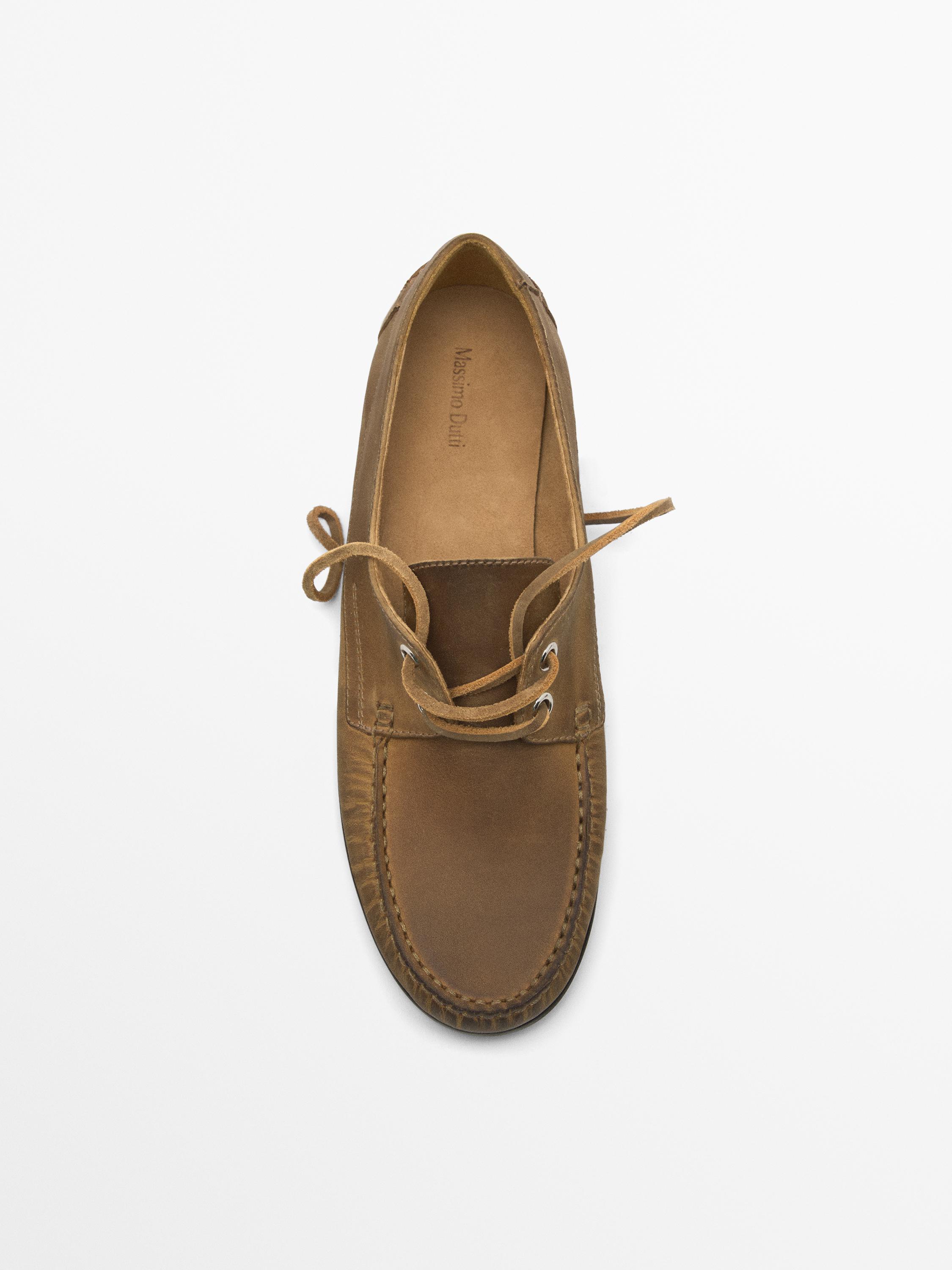 Oiled leather deck shoes