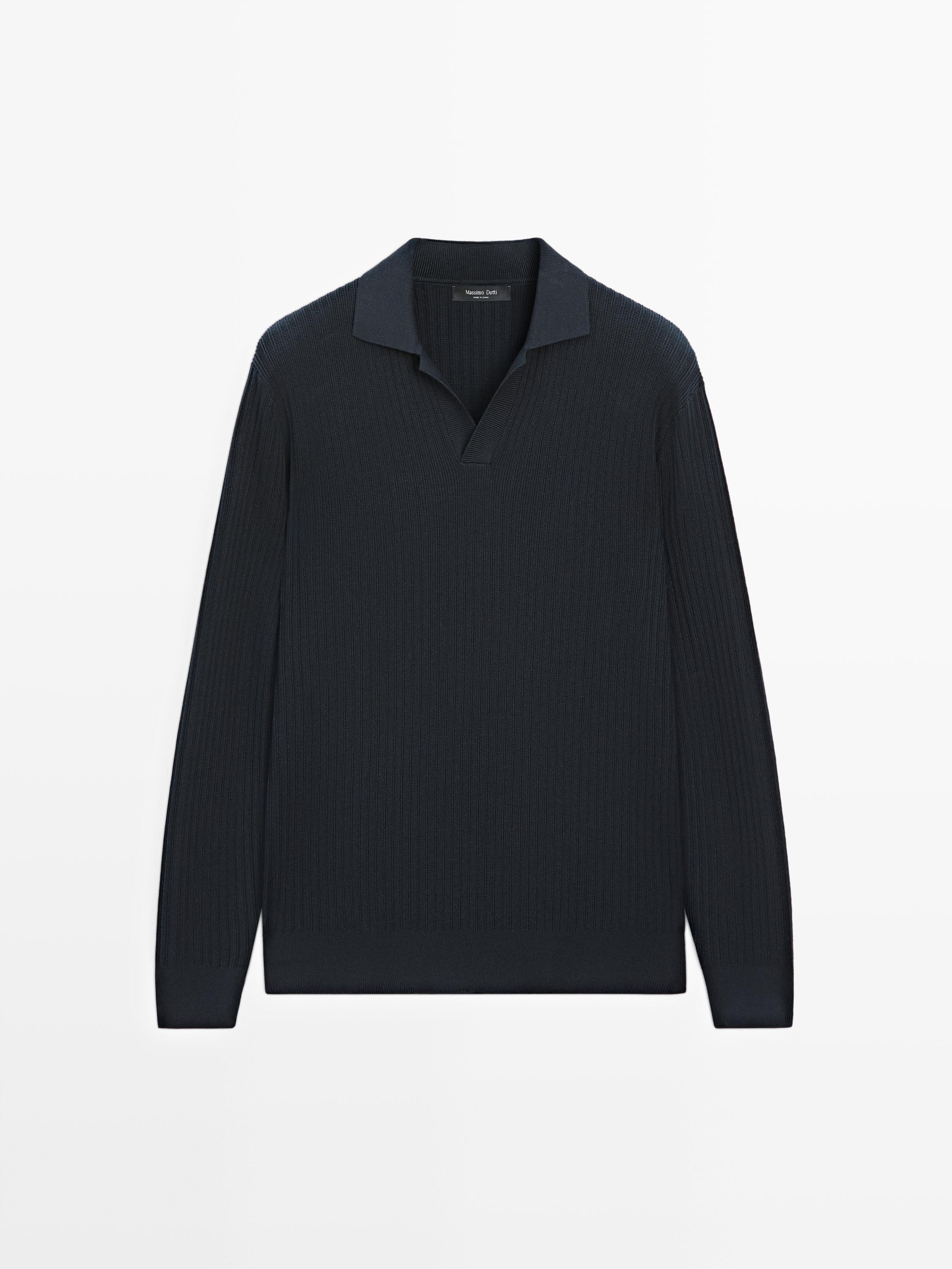 Front view of a navy blue long-sleeved open-collar polo shirt.