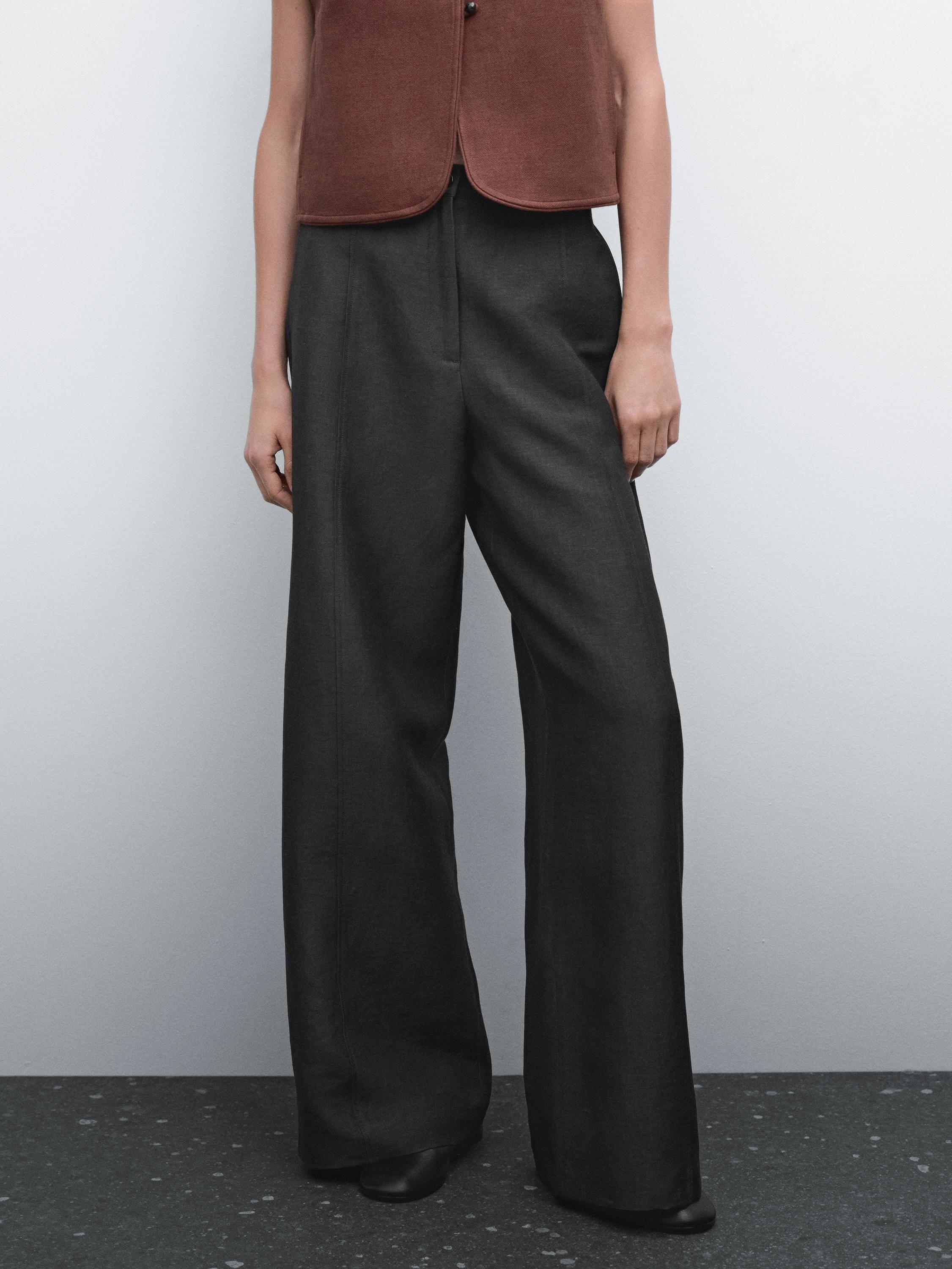 Flowing wide-leg trousers with seam details