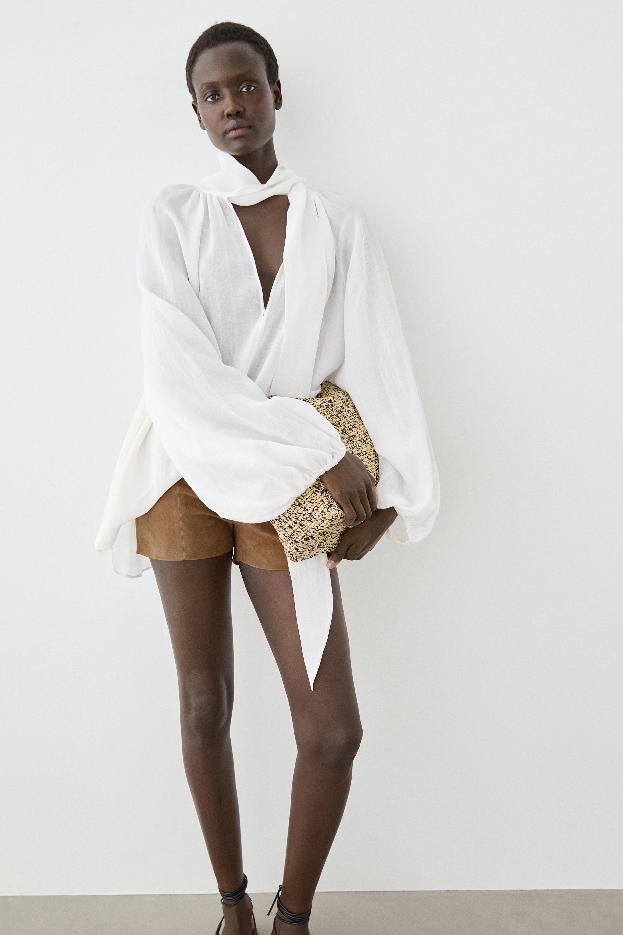 Suede leather shorts with seam details — CAMEL
