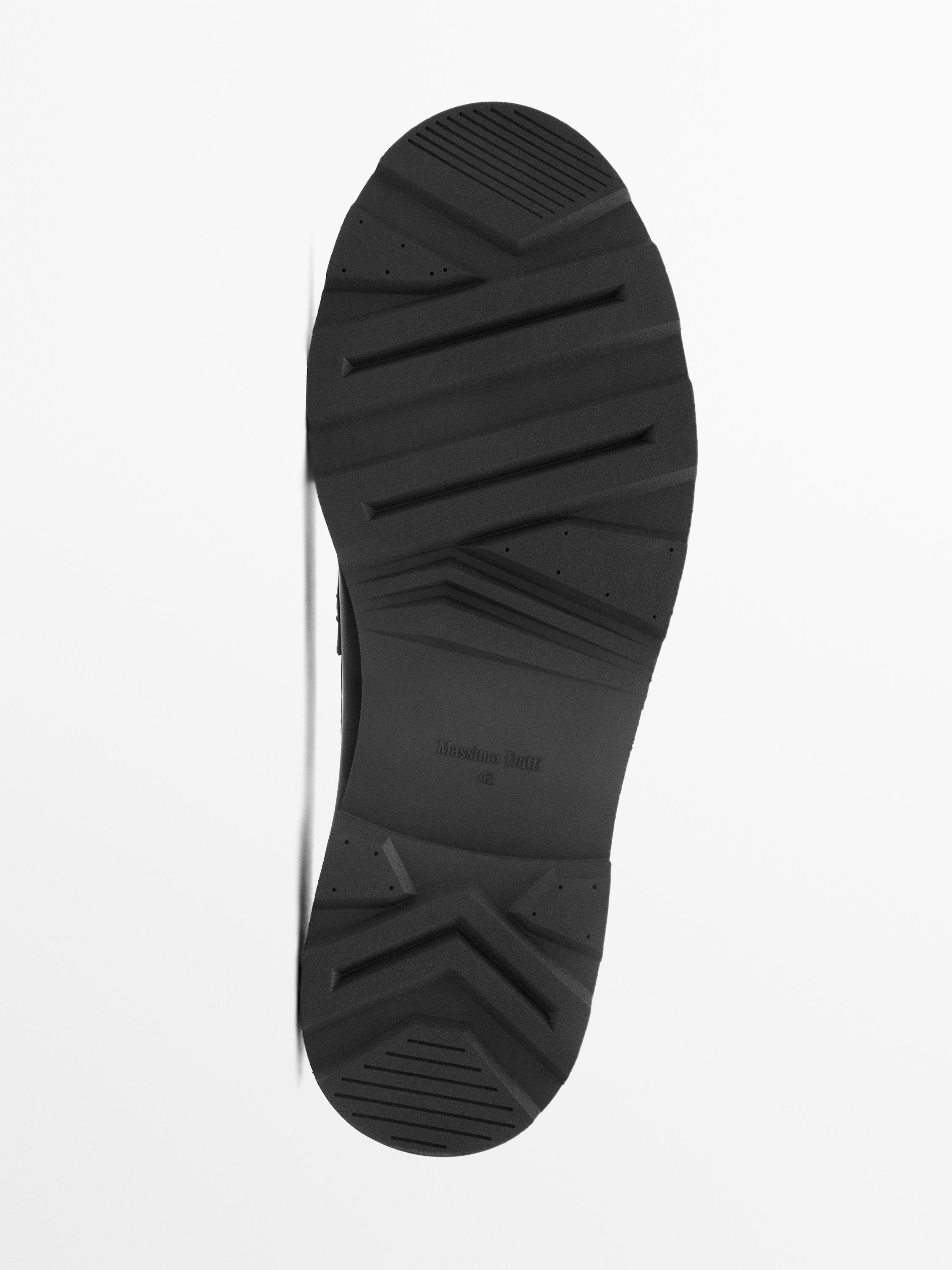 Leather track-sole loafers with penny strap — BLACK