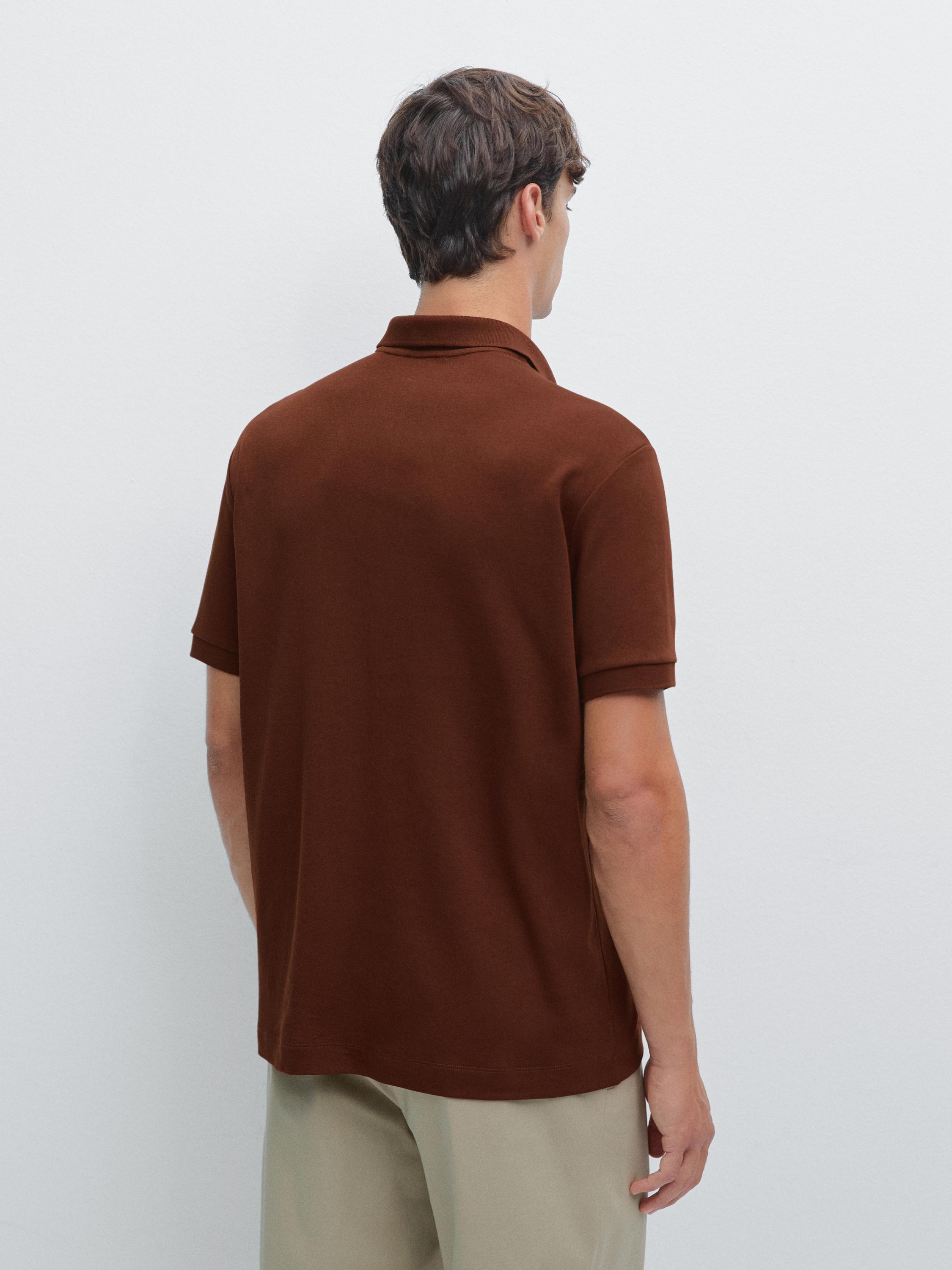 قميص بولو بأكمام قصيرة وياقة بسحاب