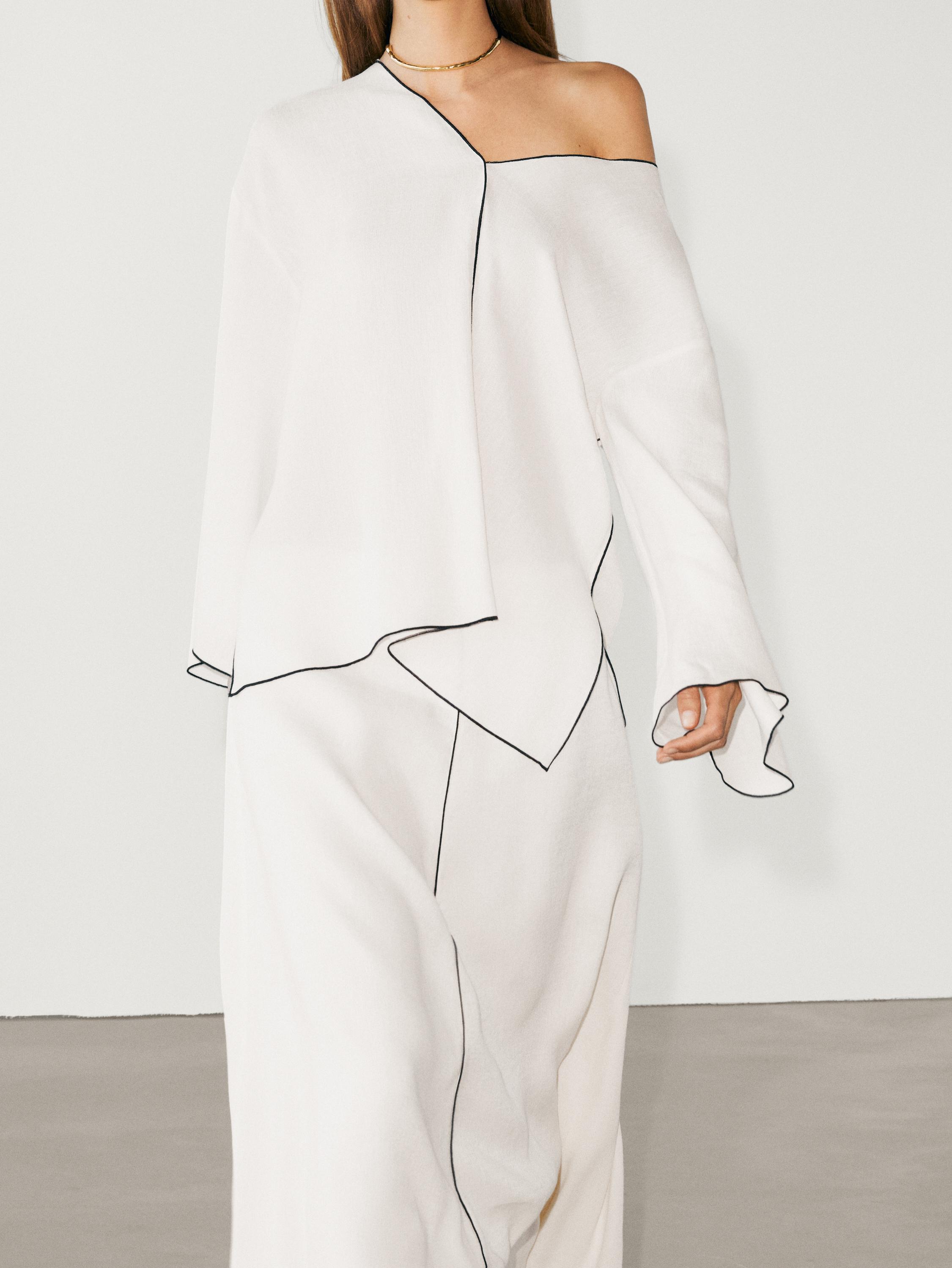 تنورة بتفاصيل حافة متباينة