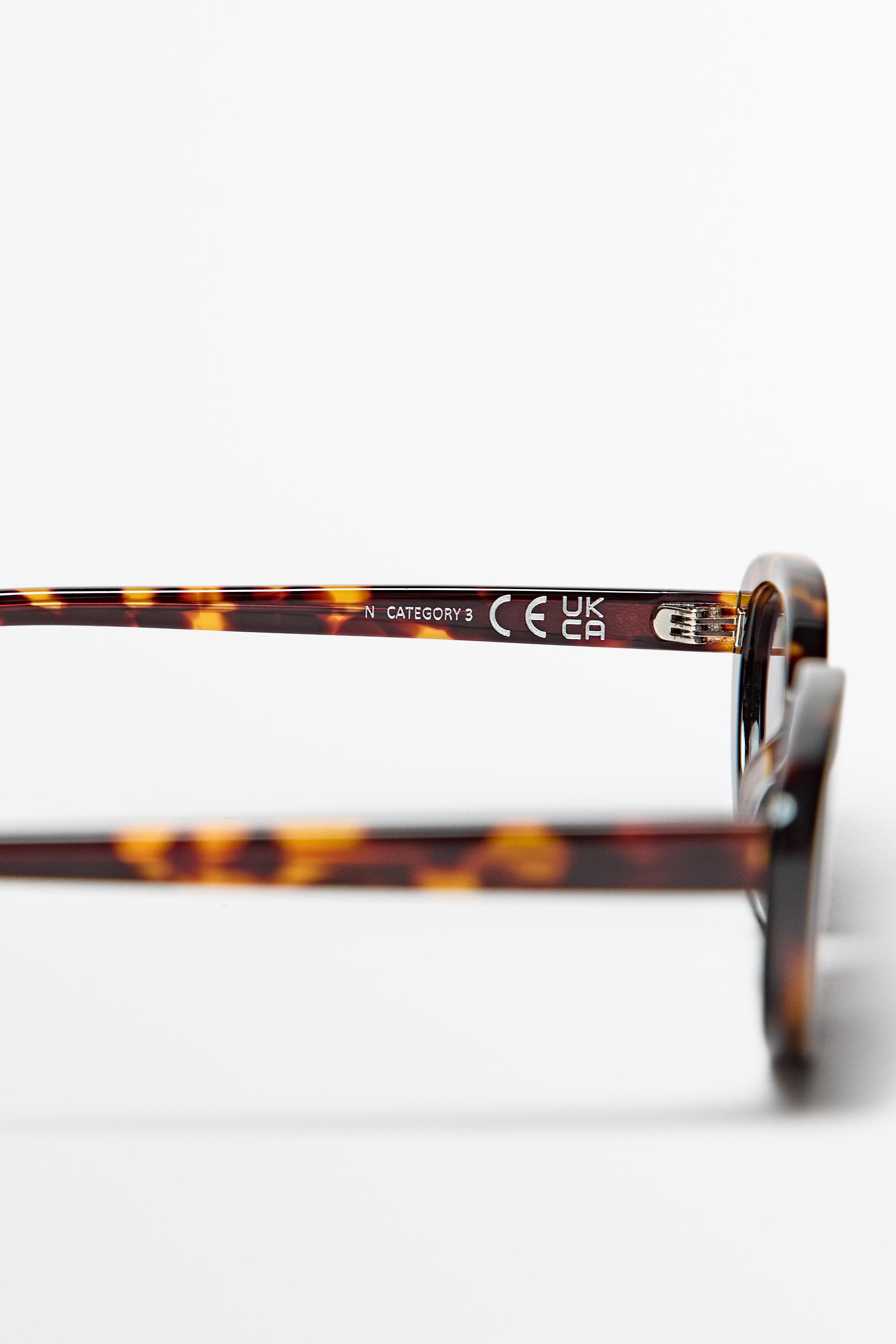 Tortoiseshell sunglasses — BROWN