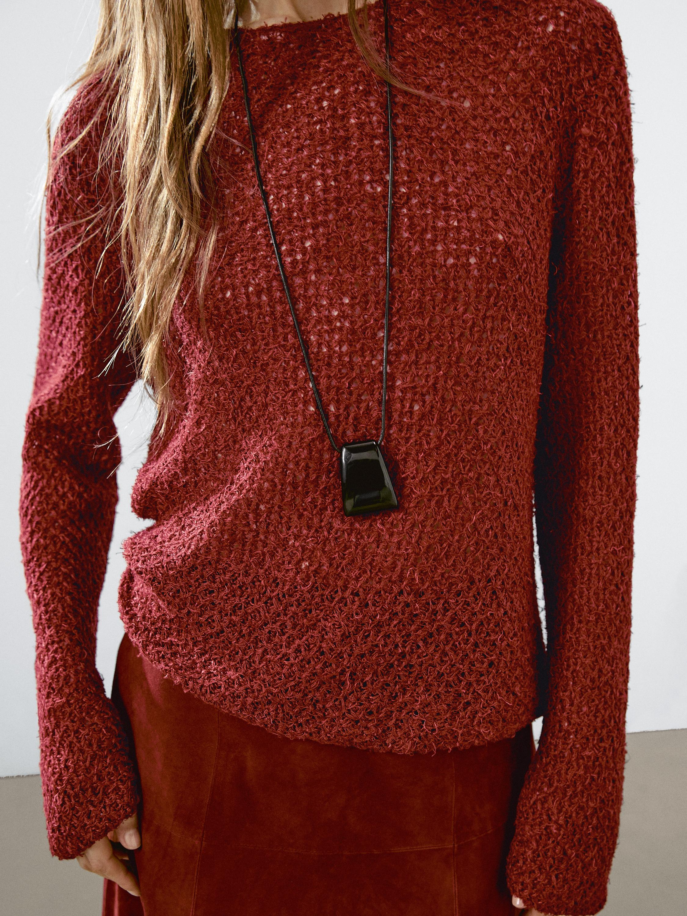 Cutwork sweater with thread detail