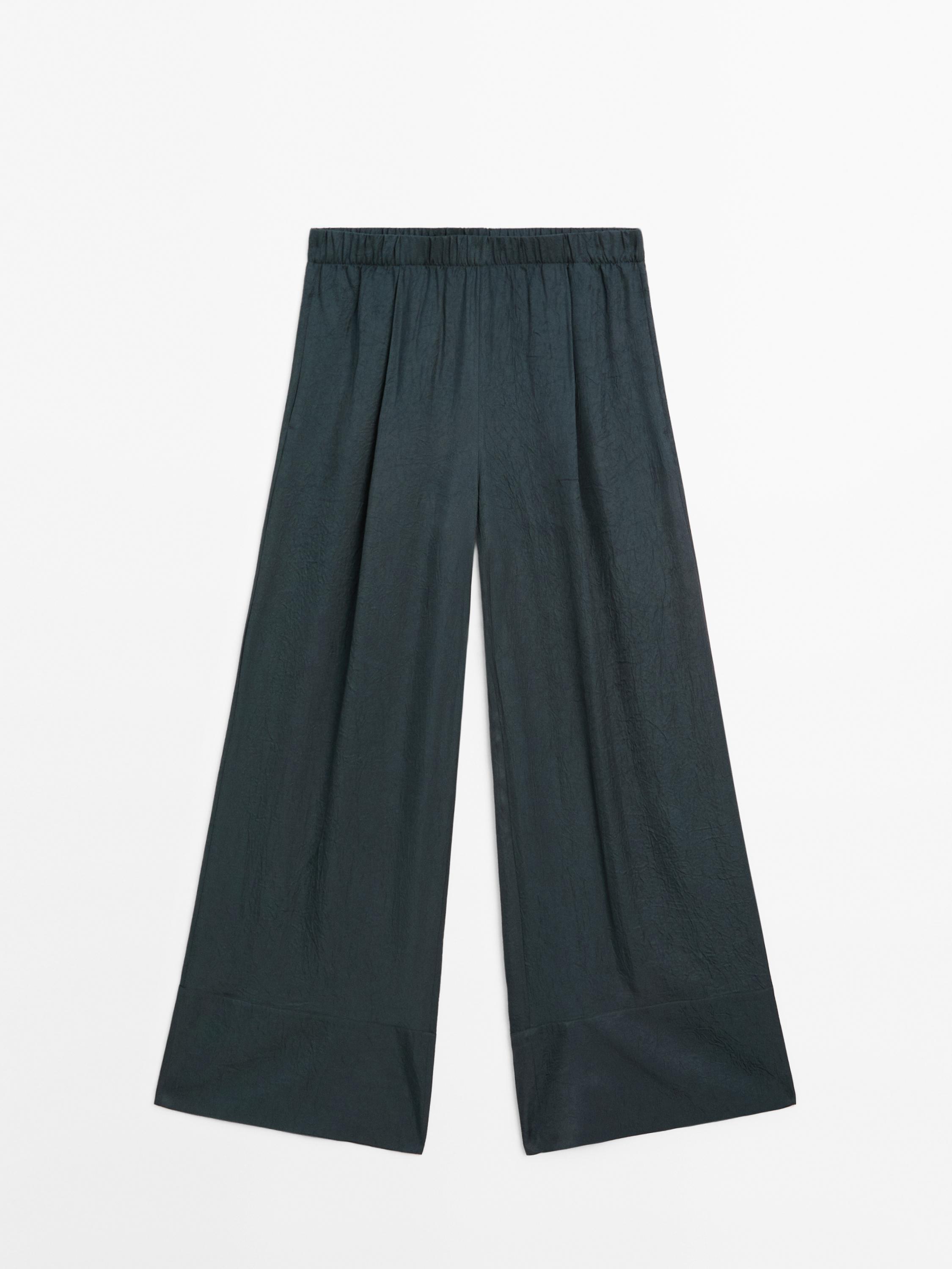 Flowing creased-effect trousers