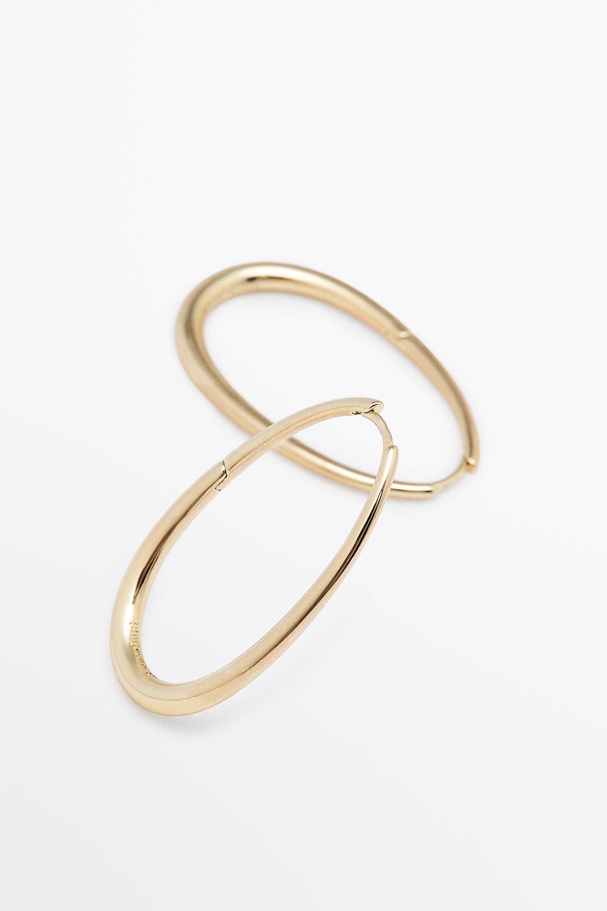 Oval hoop earrings — GOLDEN