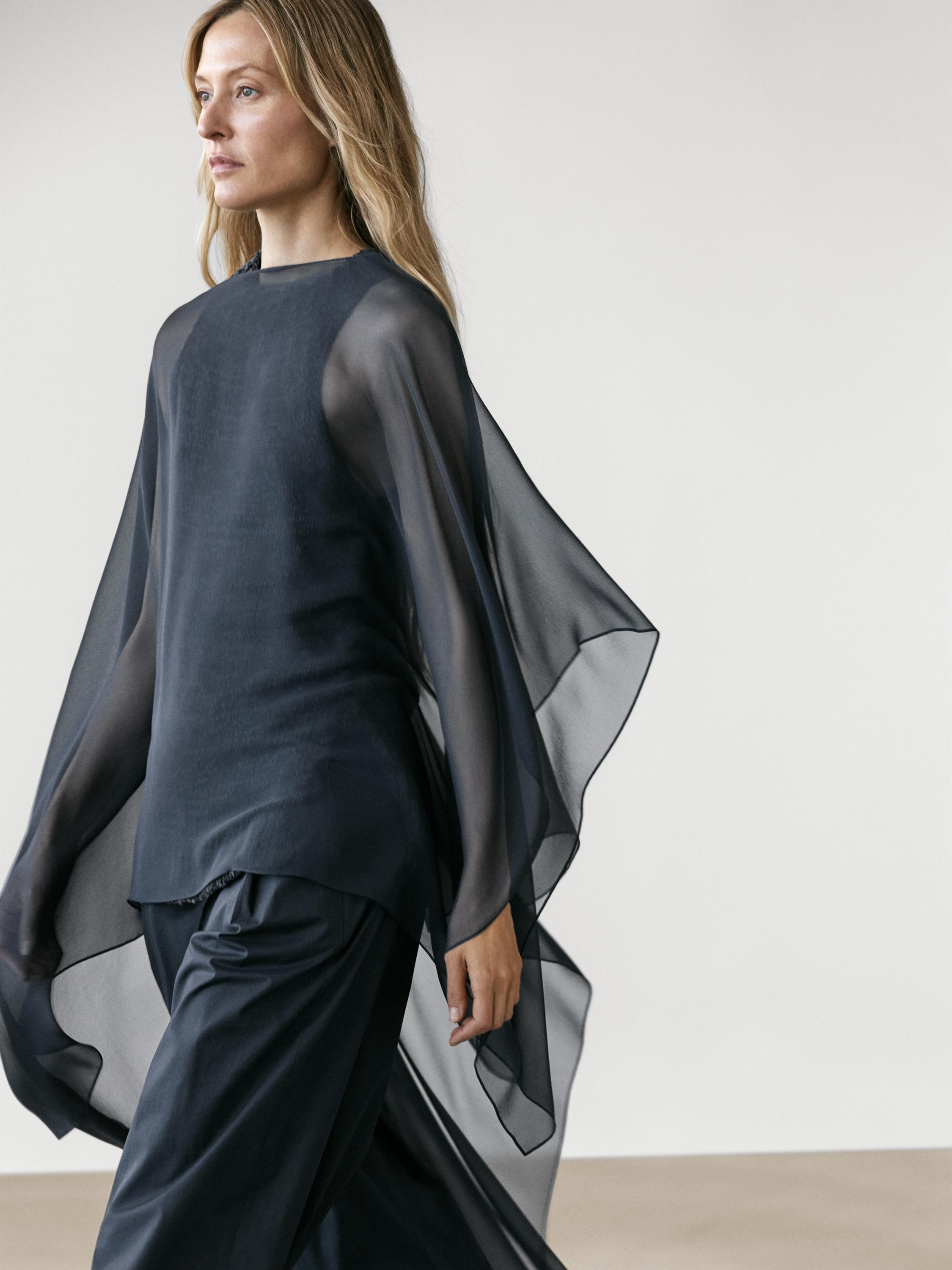 Asymmetric cut silk cape