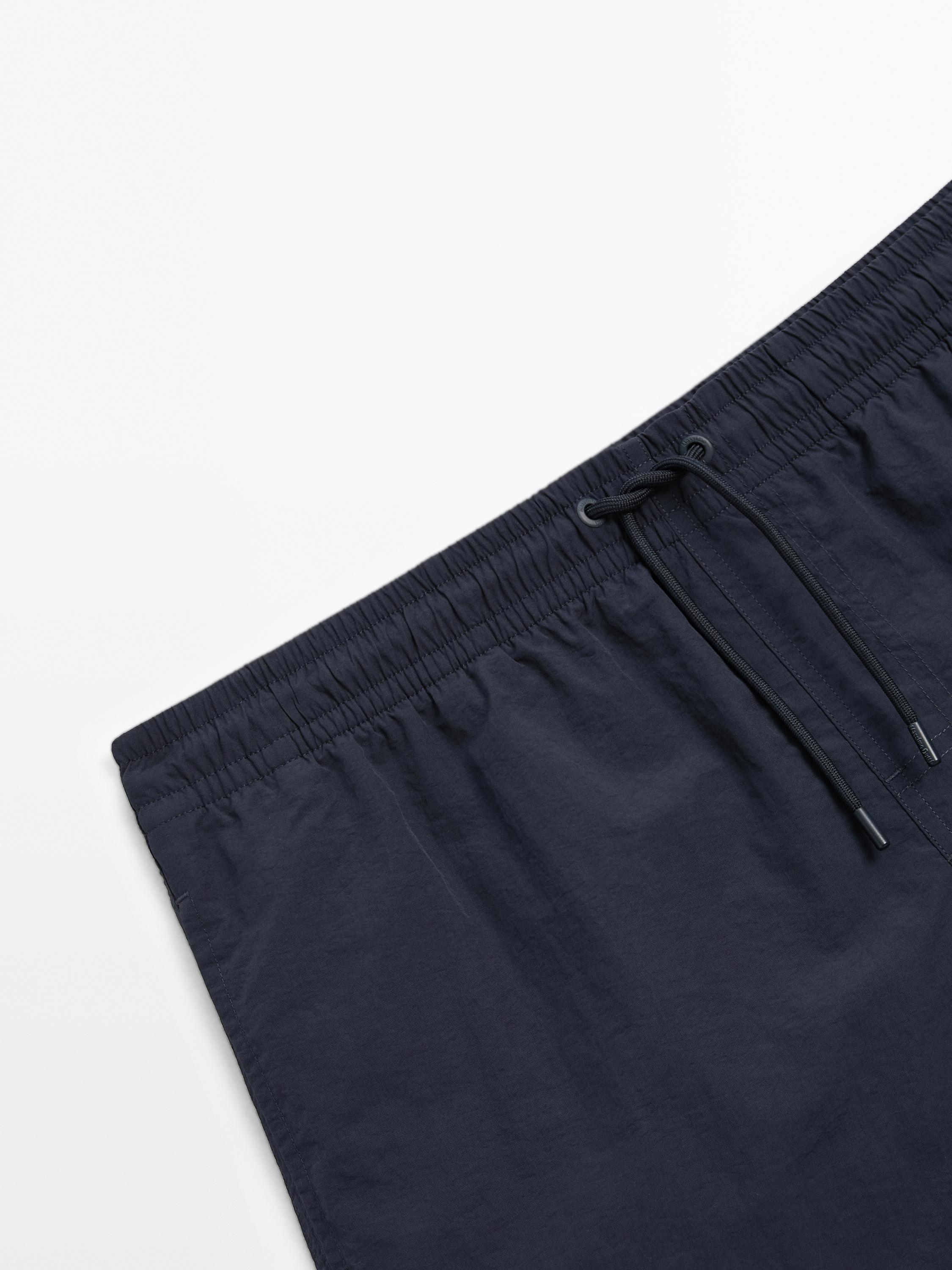 Plain short fit swimming trunks