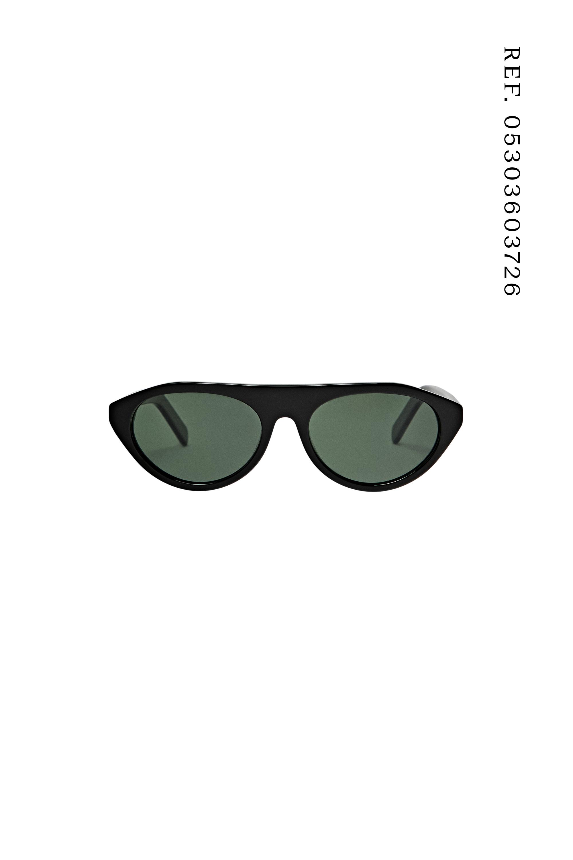 Oval sunglasses — BLACK