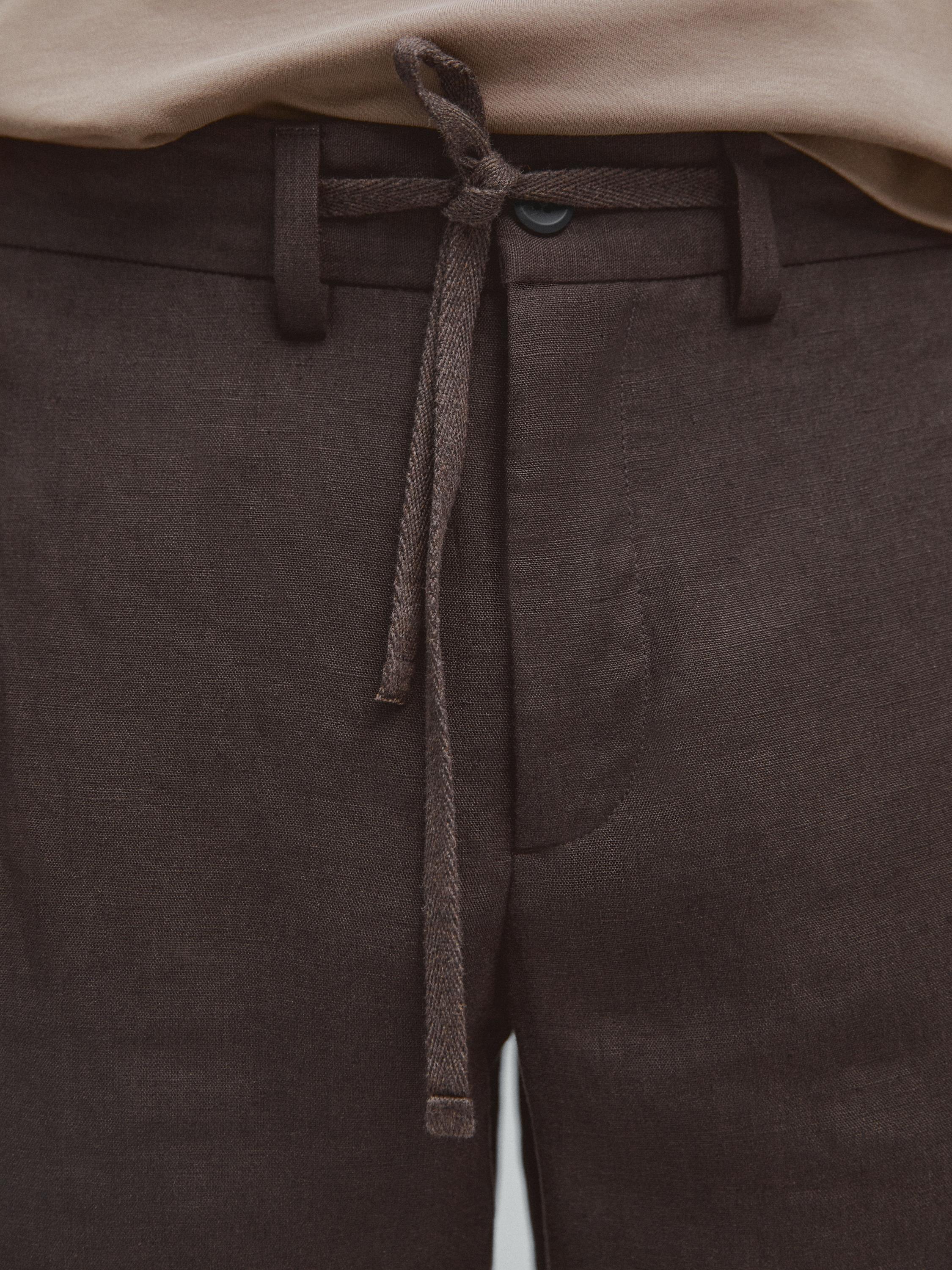 Total look linen trousers — Chocolate