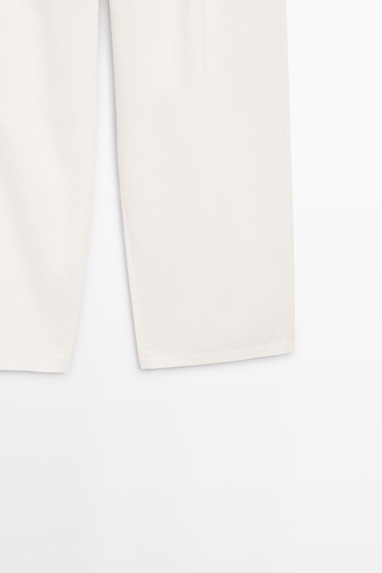 Pleated pants with crossover fastening detail - STUDIO — CREAM