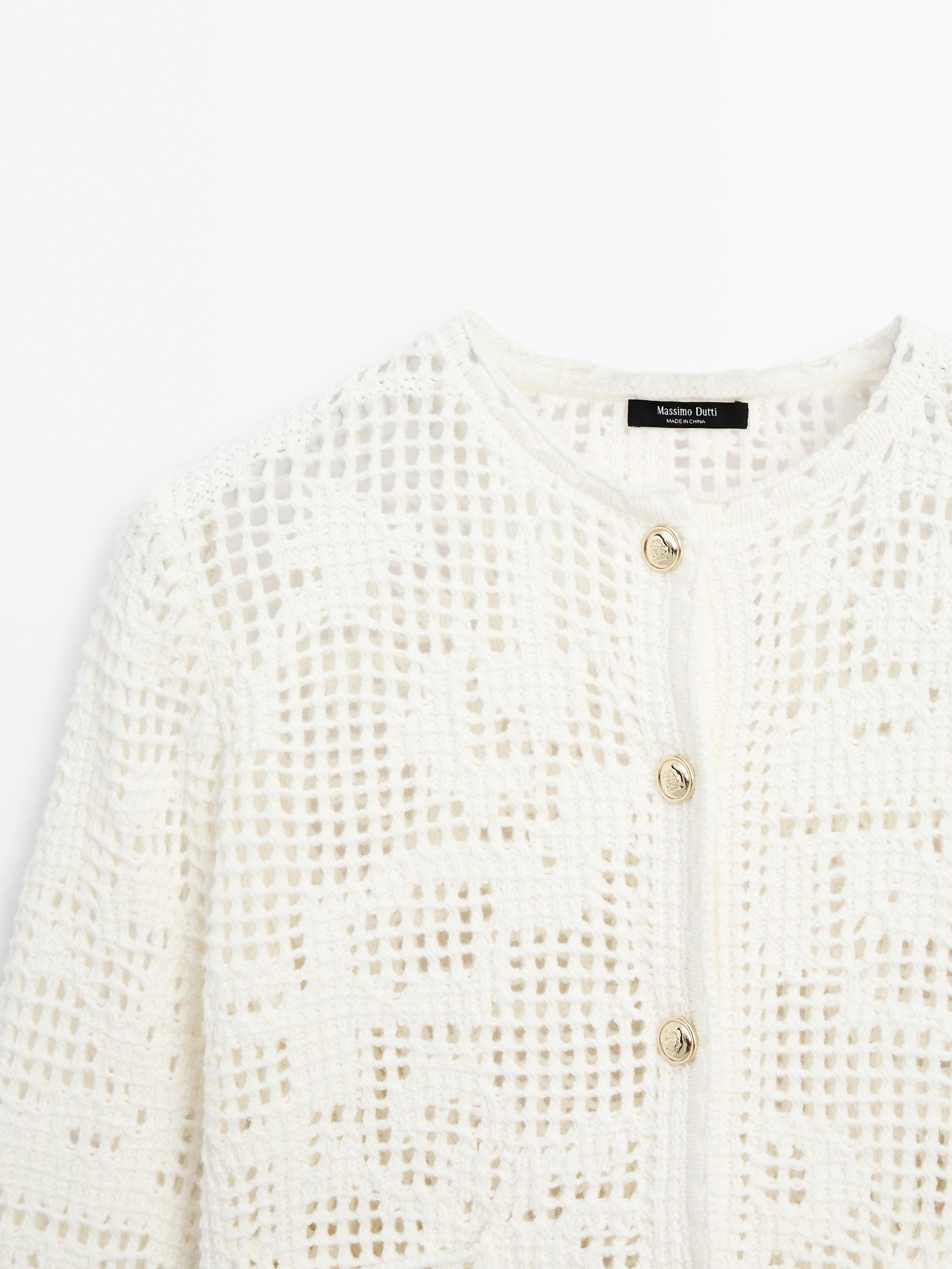 Crochet cardigan with rhinestone buttons