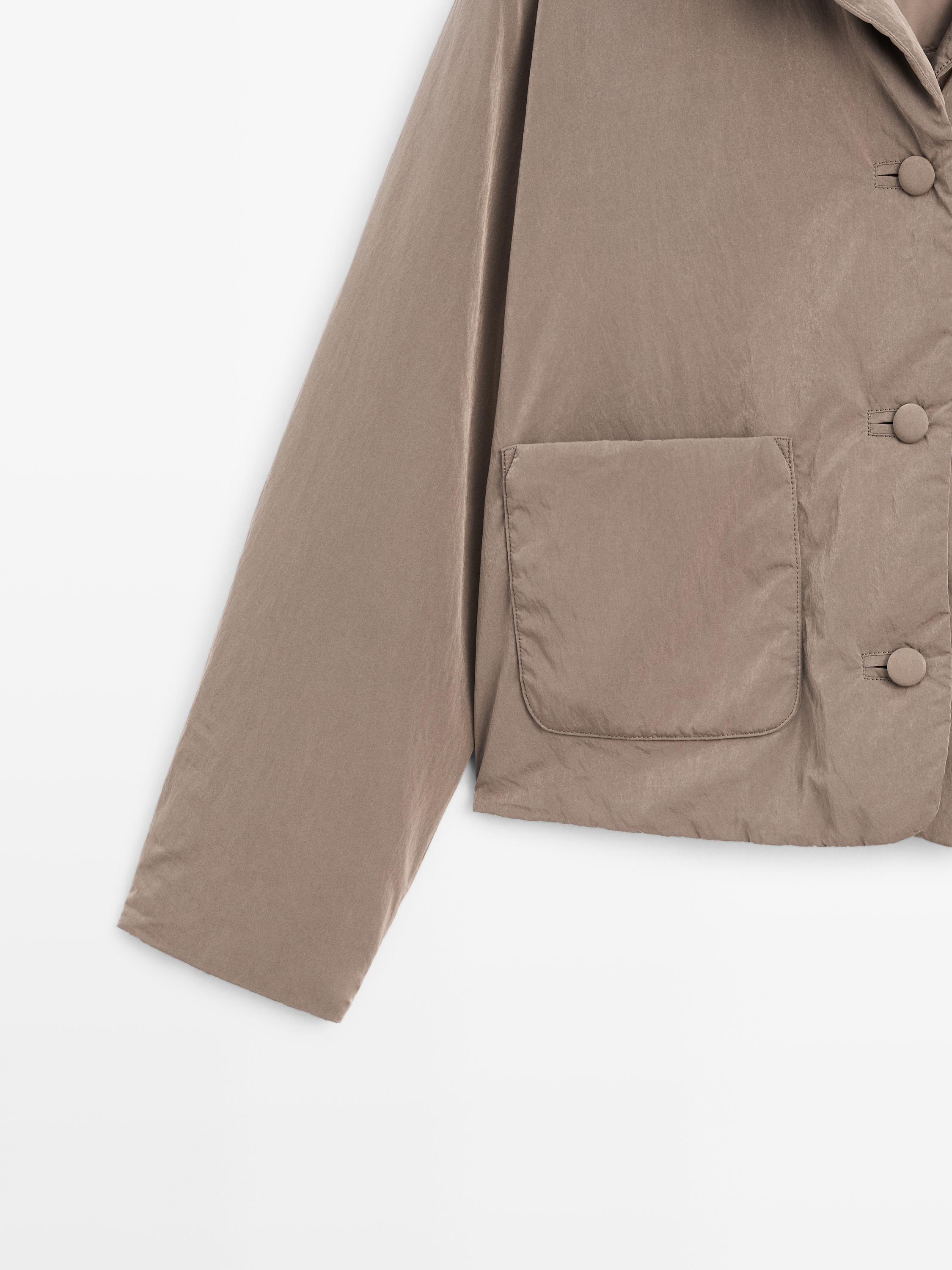 Cropped puffer jacket with covered buttons