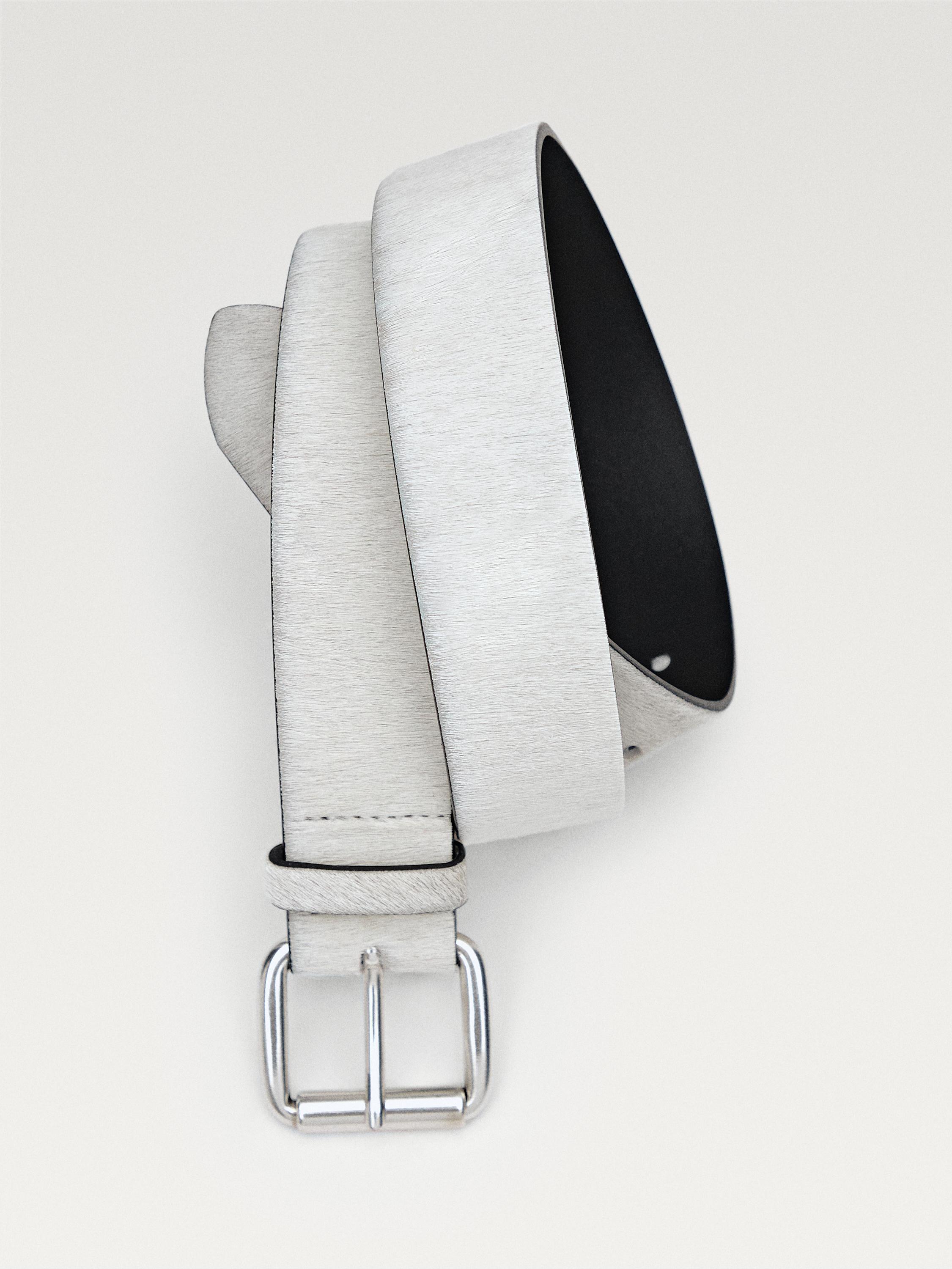 Hair on leather belt