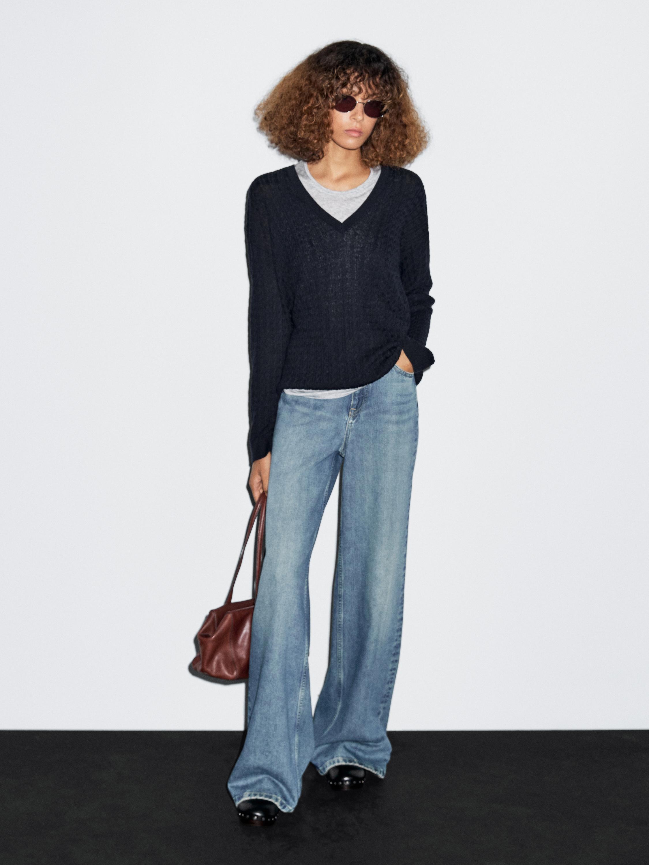 V-neck cable-knit sweater