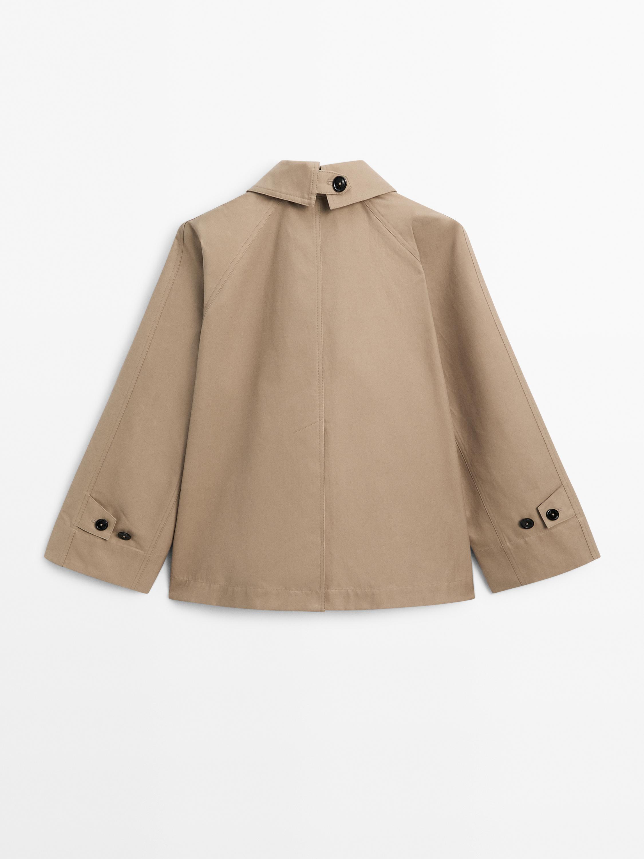 Short water-repellent cape trench coat