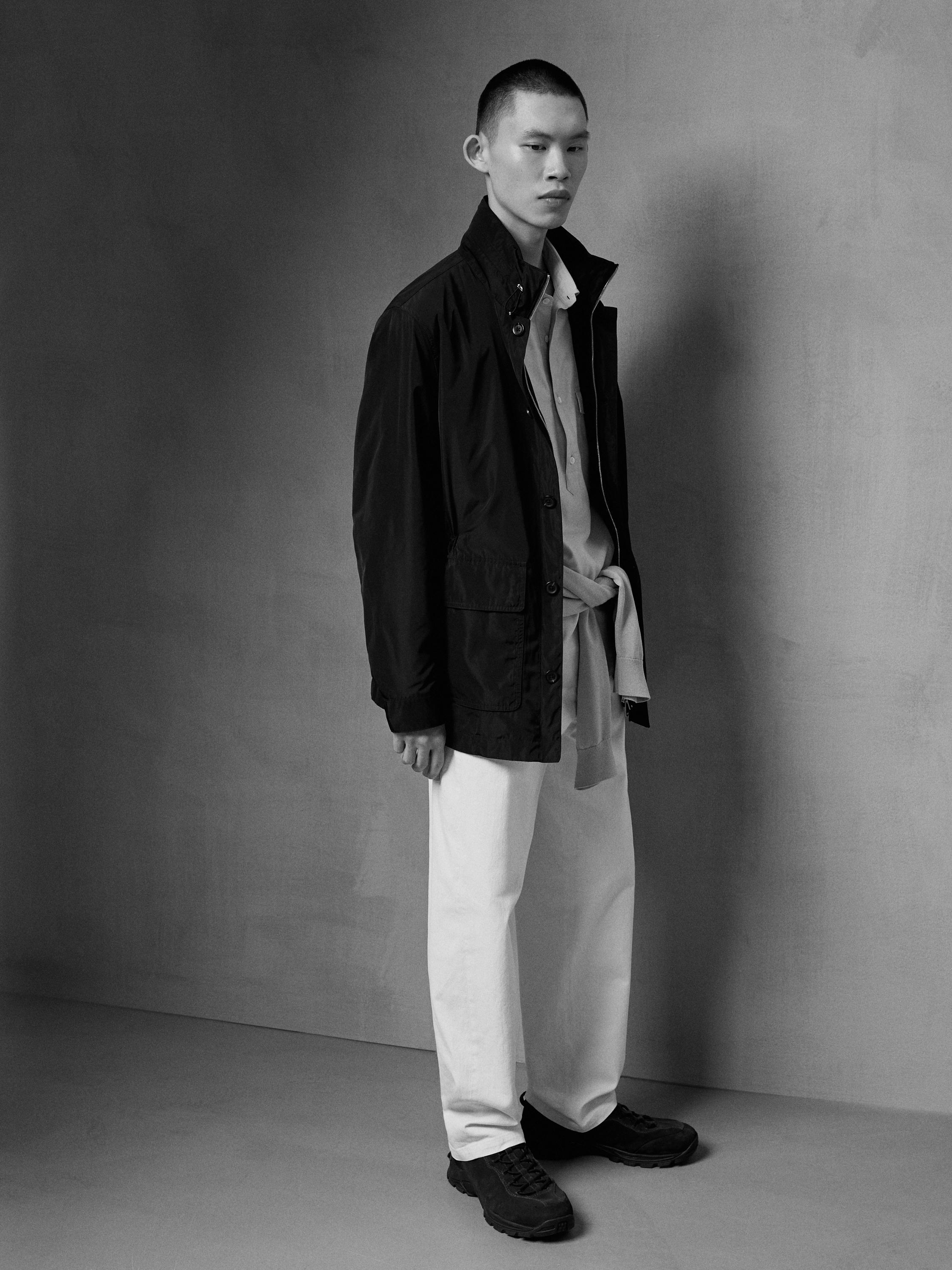 Hooded parka with fabric detail