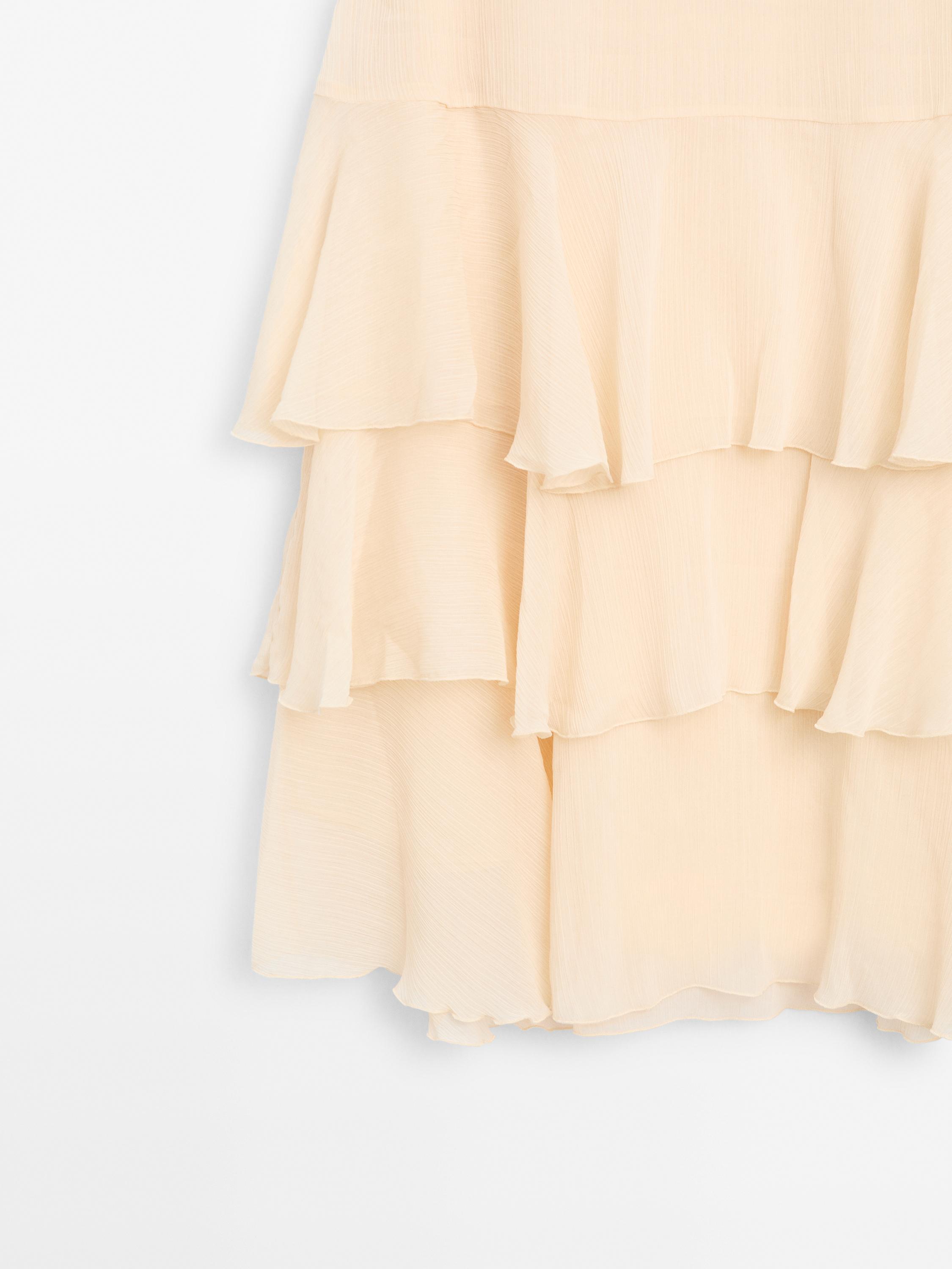 Long ruffled skirt with sash