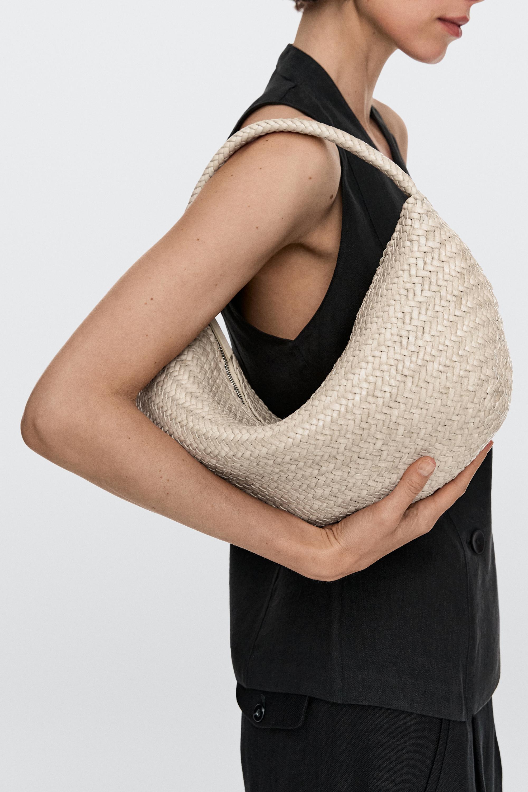 Braided leather half-moon bag — CREAM