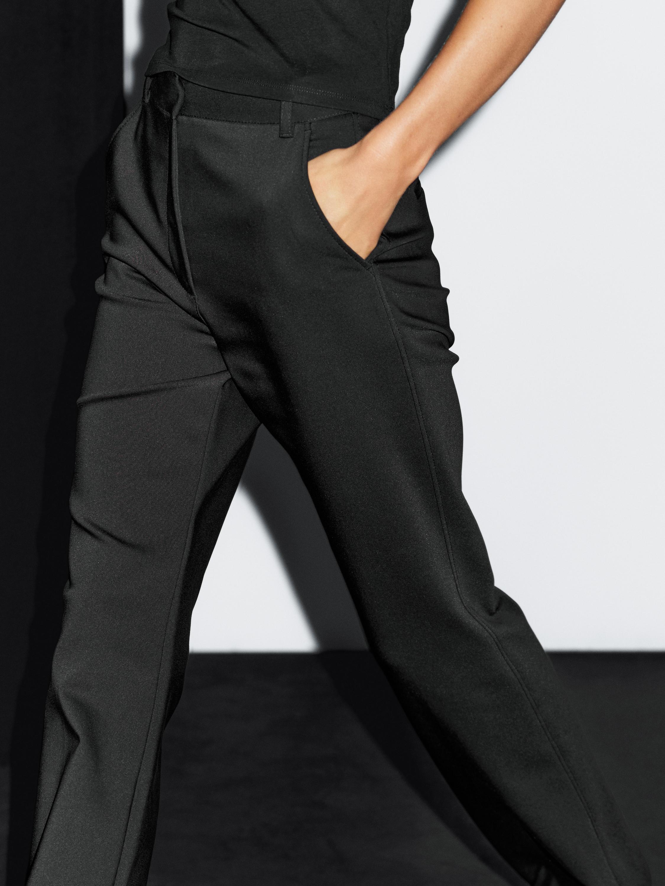 Flared stretch trousers