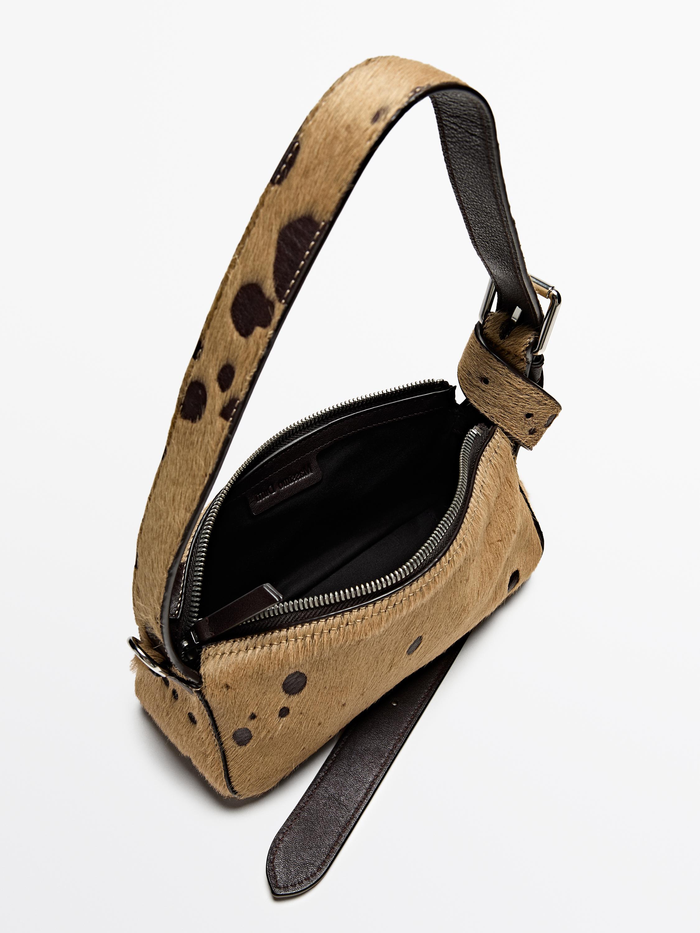 Printed mini hair on leather bag