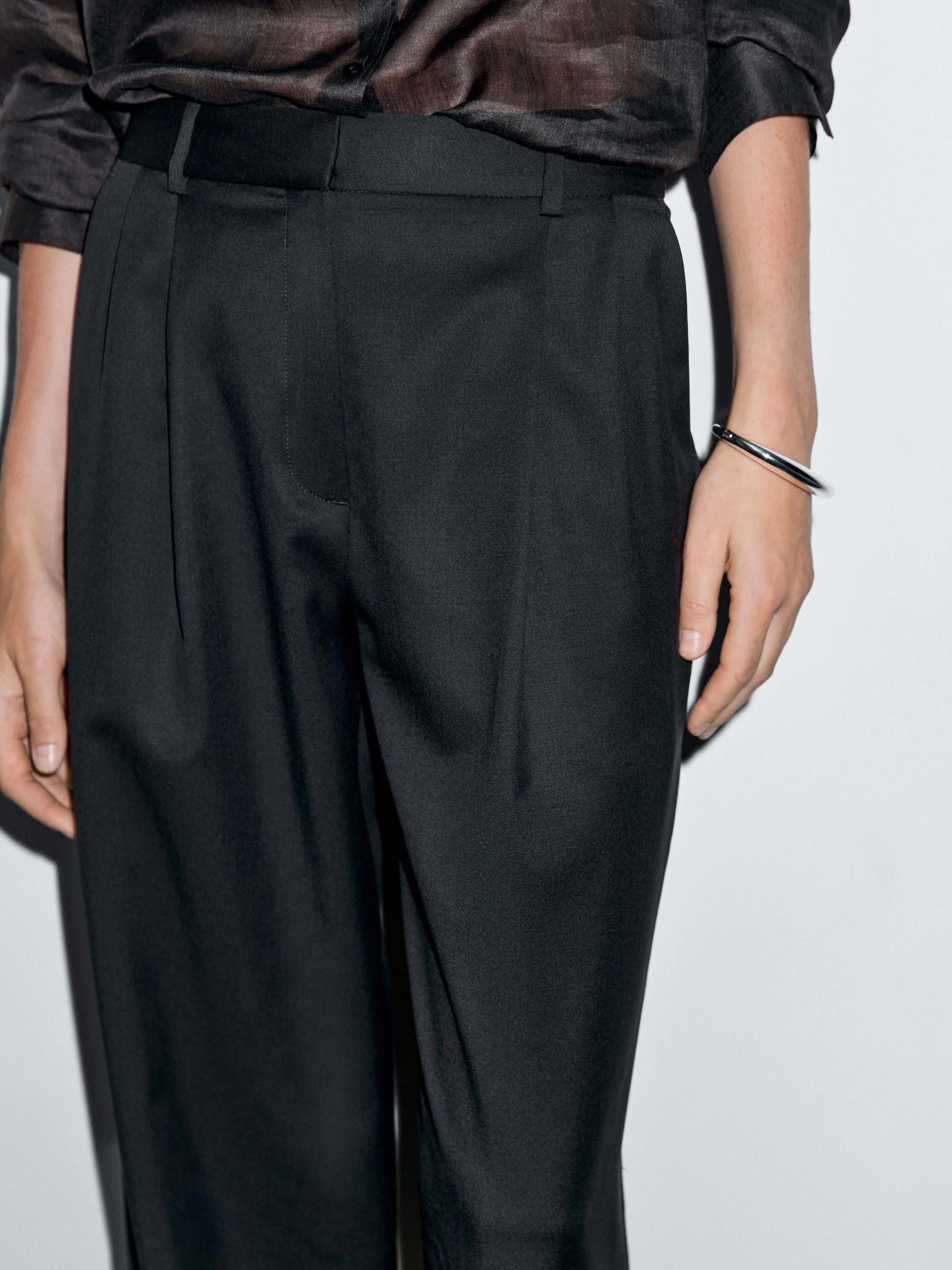 100% extra fine wool pleated trousers