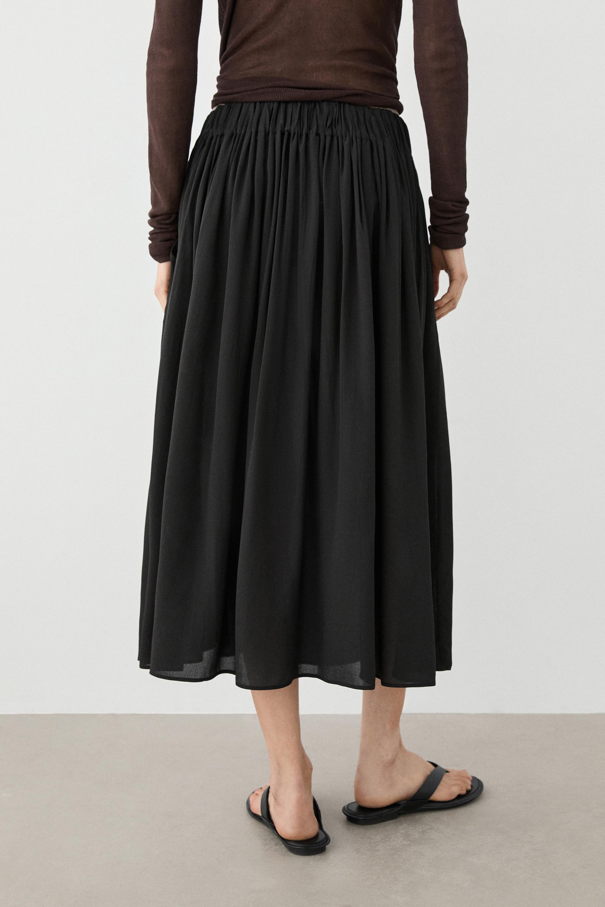 Pleated midi skirt — BLACK